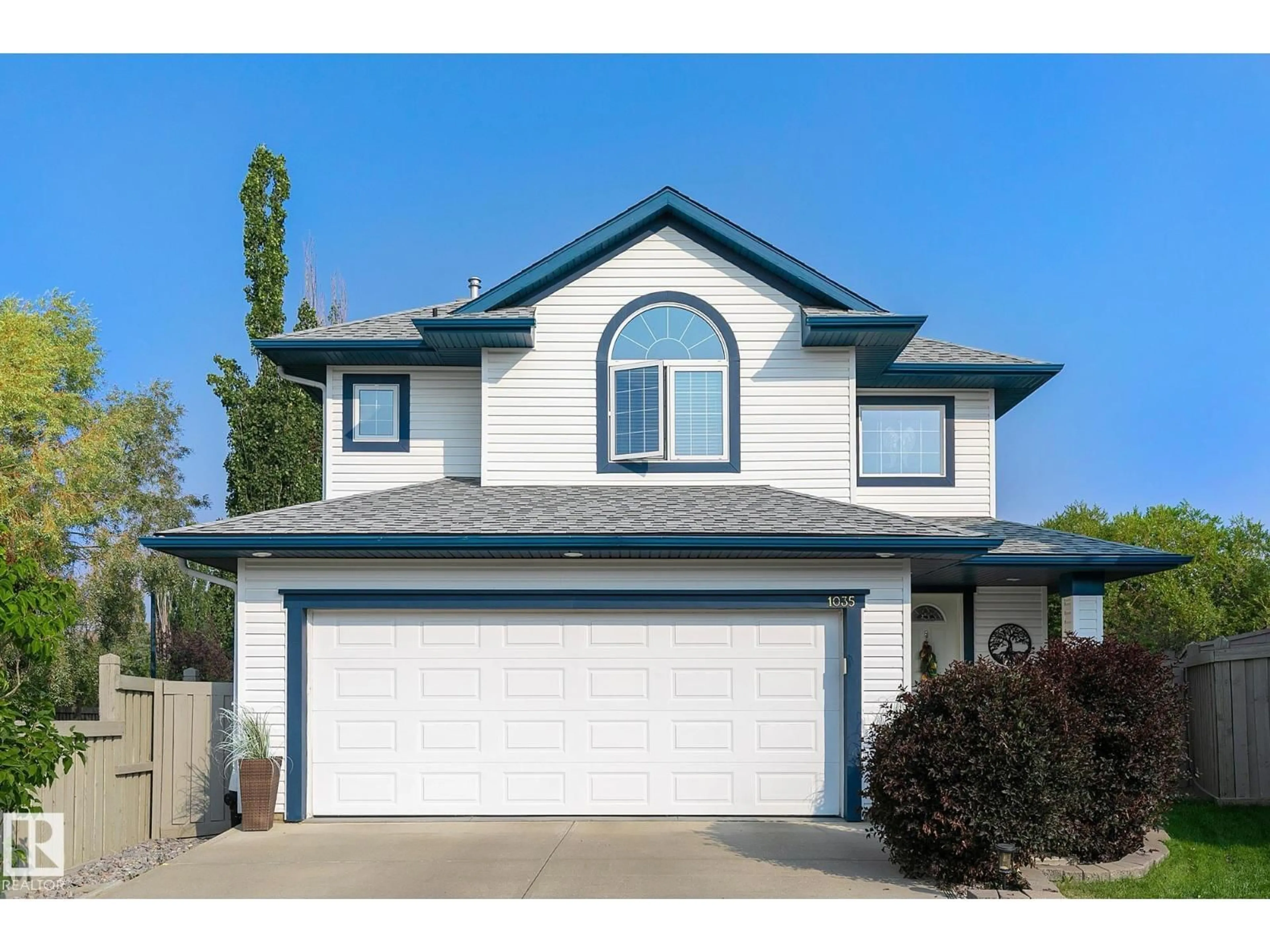 Home with vinyl exterior material, street for 1035 MACEWAN CL, Edmonton Alberta T6W1K2
