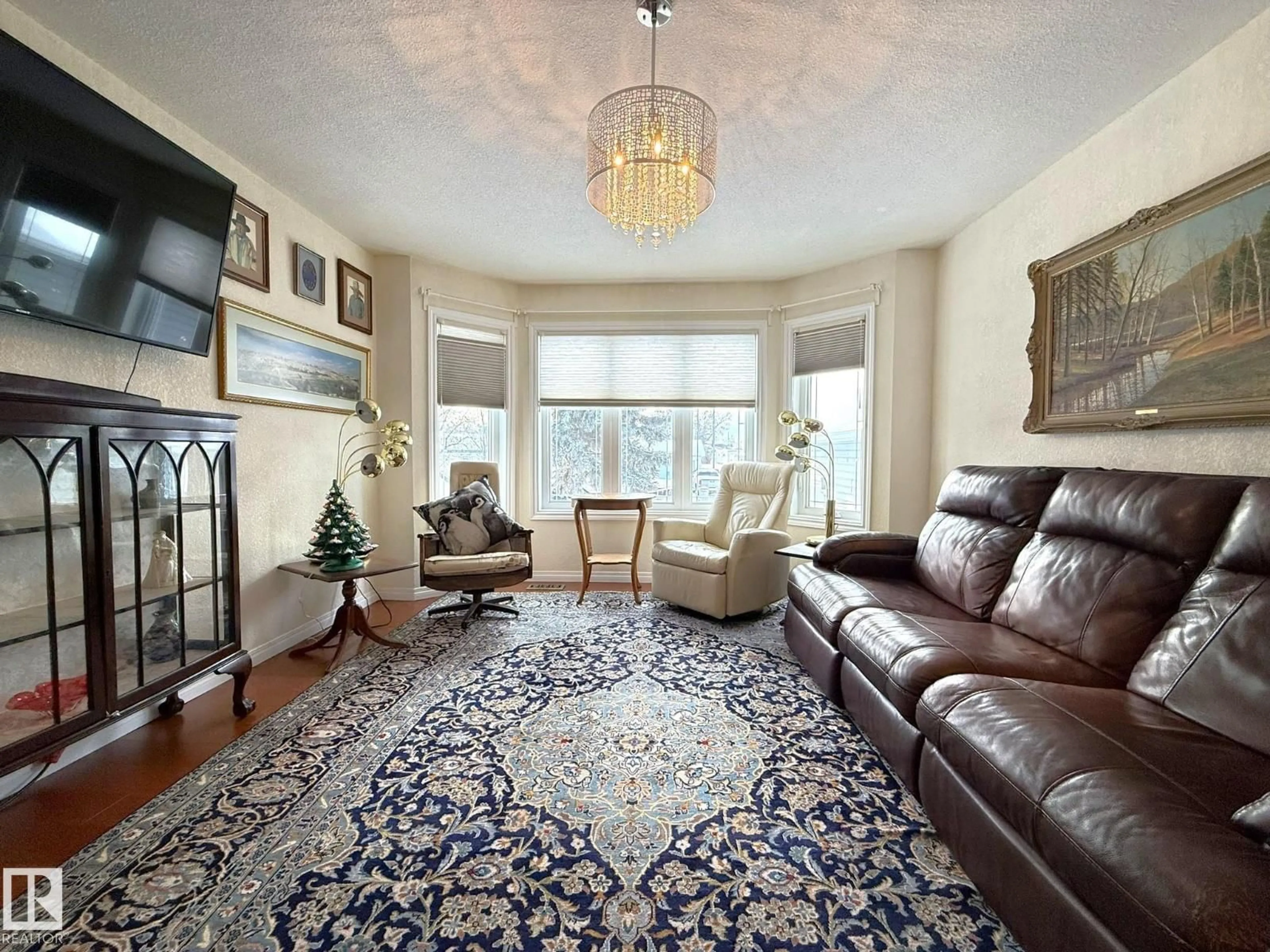 Living room with furniture, carpet floor for 5006 46 AV, Calmar Alberta T0C0V0