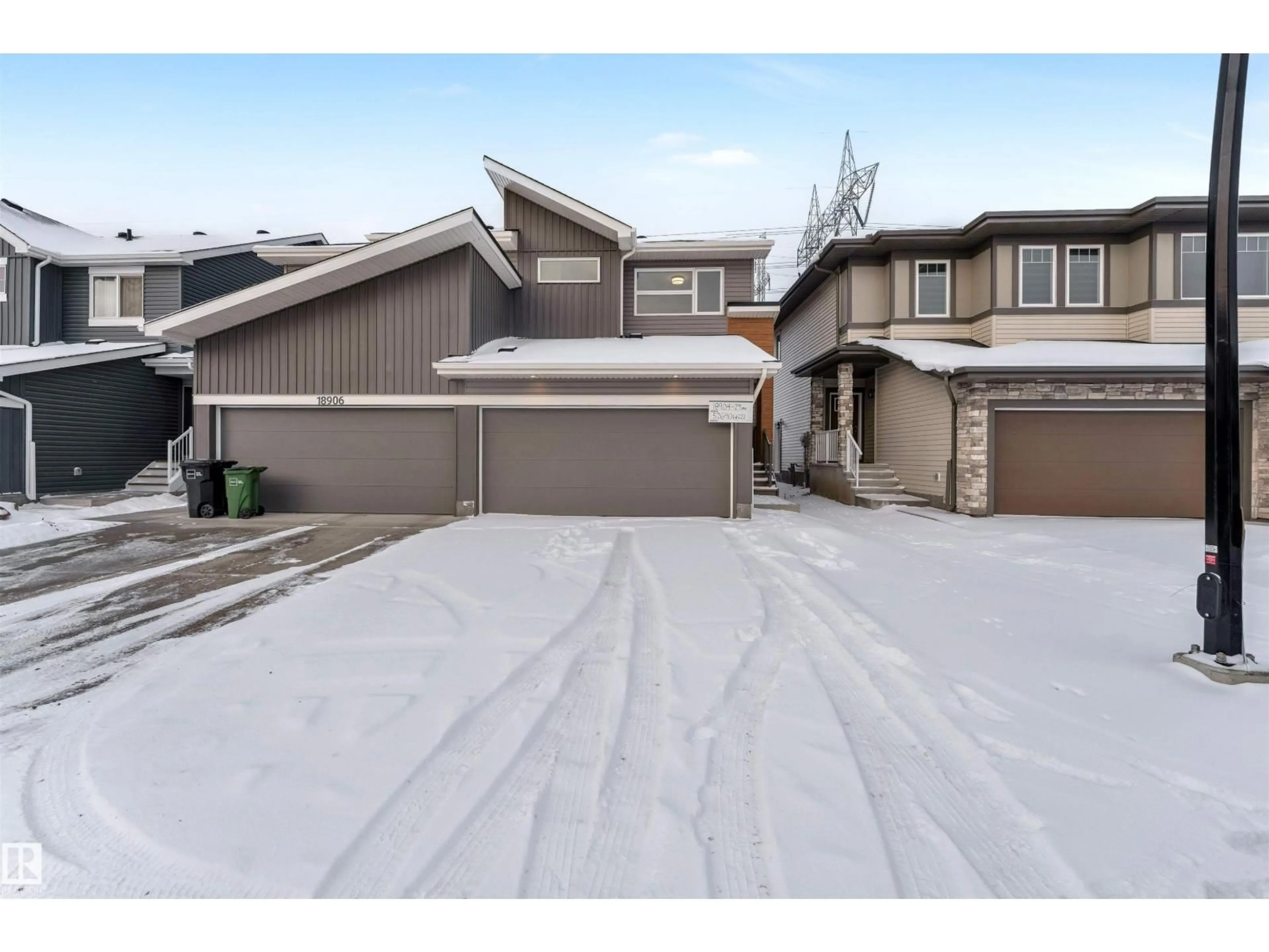 Home with vinyl exterior material, street for 18904 29 AV, Edmonton Alberta T6M3C5