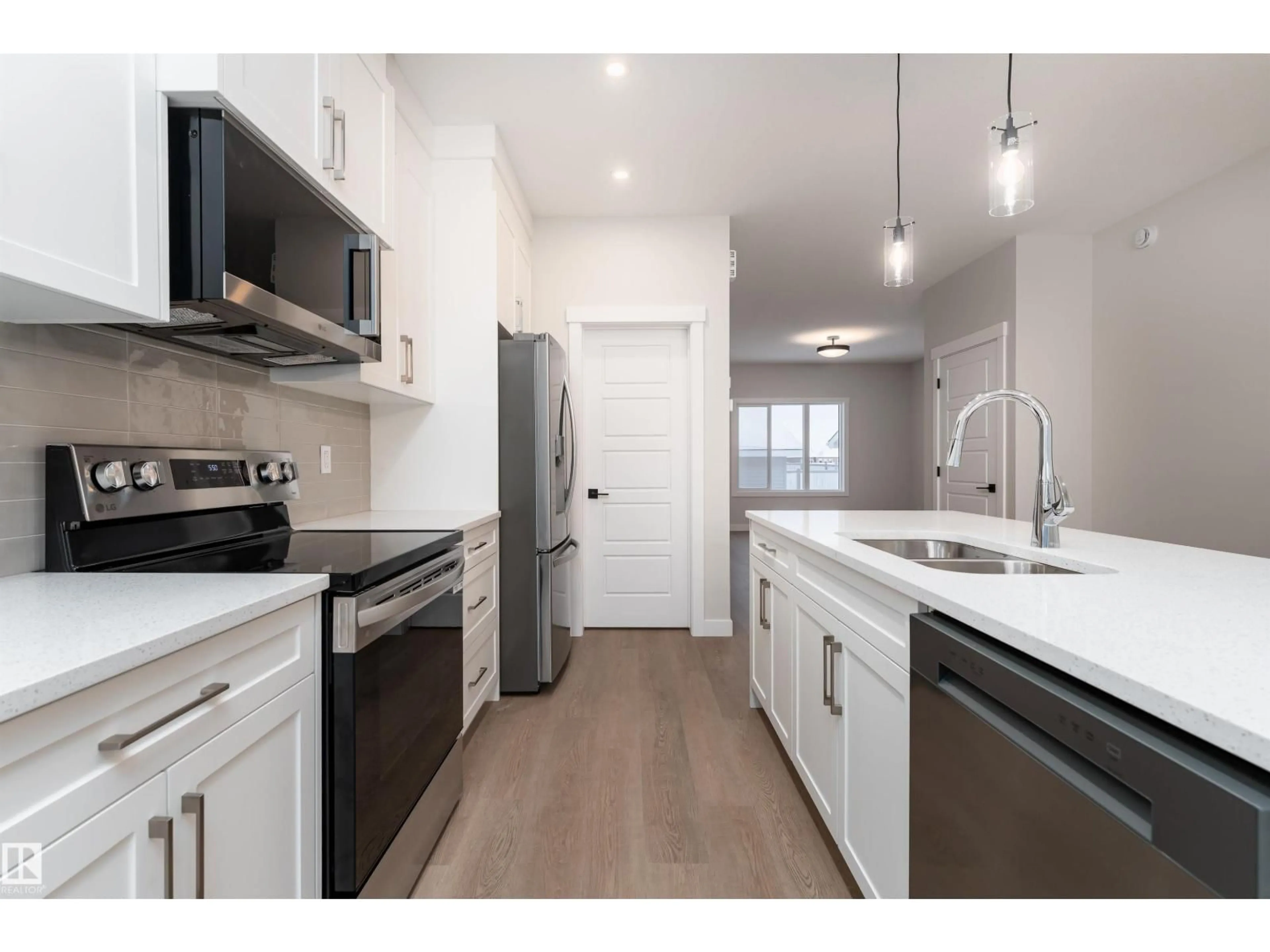 Open concept kitchen, unknown for 8530 96 AVENUE, Morinville Alberta T8R2R6