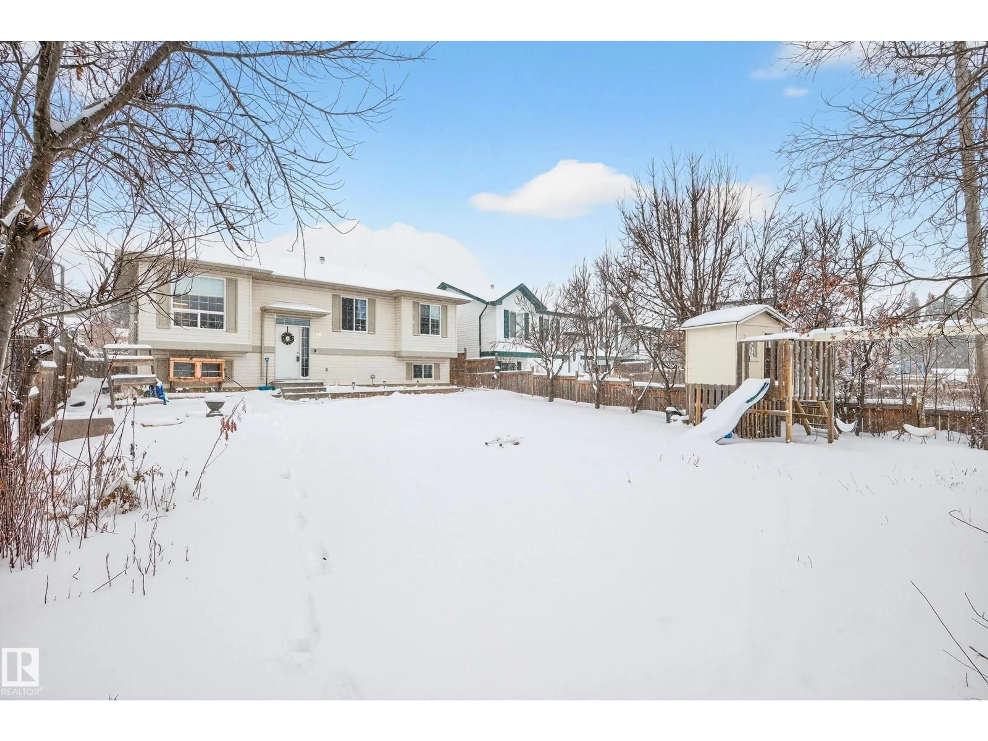 A pic from outside/outdoor area/front of a property/back of a property/a pic from drone, street for 22 SPRUCE MEADOW LN, Bon Accord Alberta T0A0K0