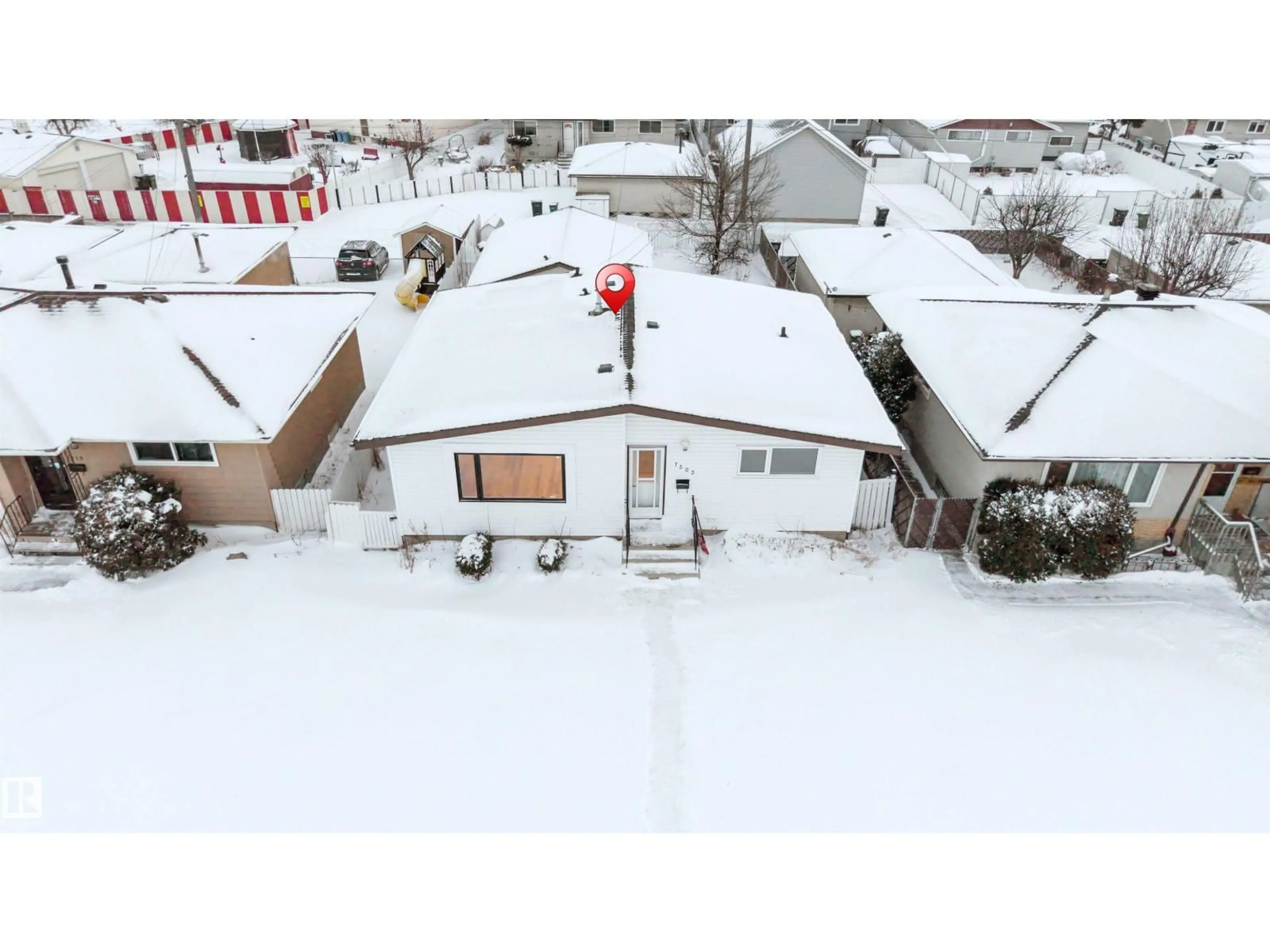 A pic from outside/outdoor area/front of a property/back of a property/a pic from drone, street for 7303 130 AVE, Edmonton Alberta T5C1Y1