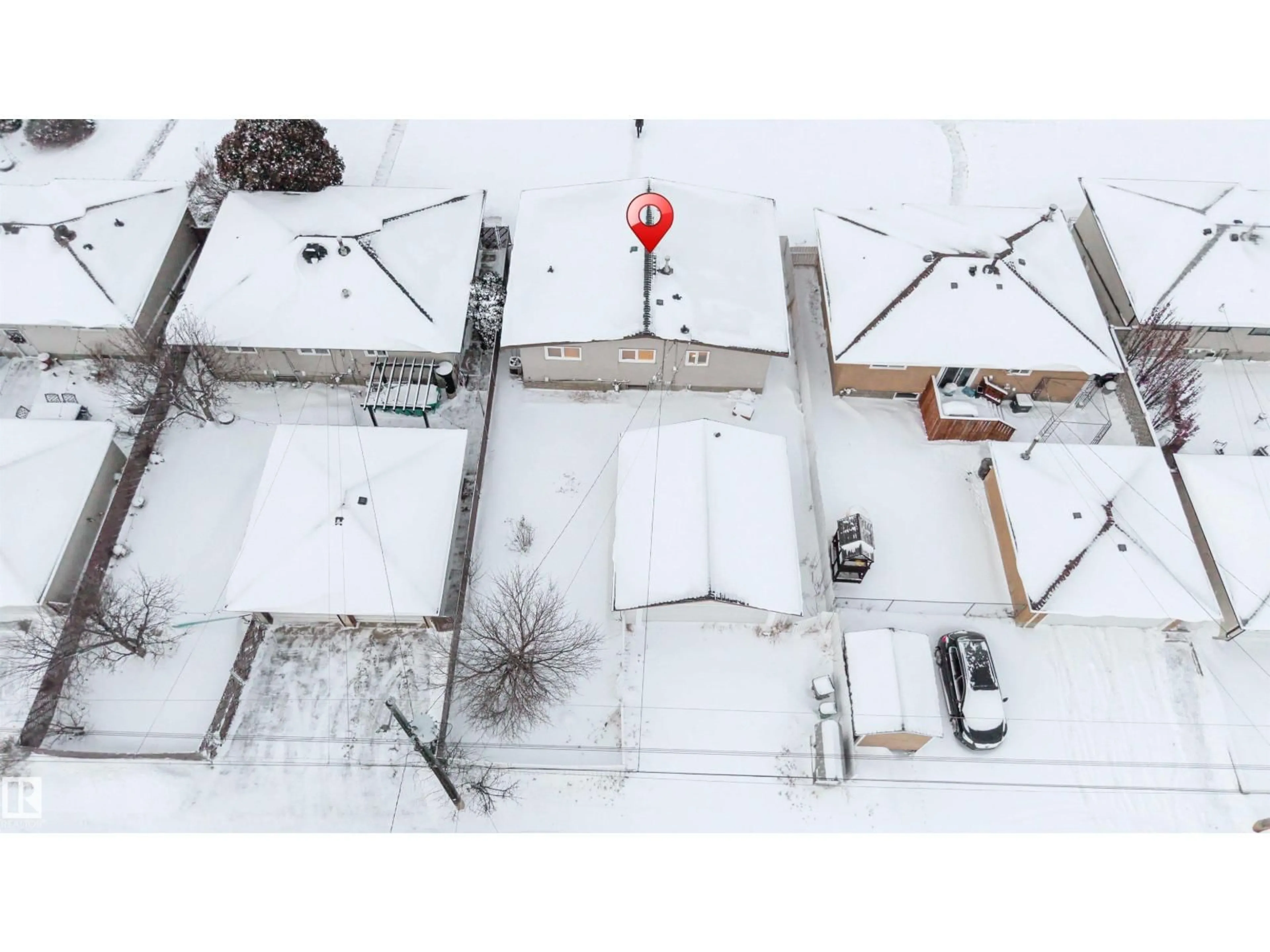 A pic from outside/outdoor area/front of a property/back of a property/a pic from drone, street for 7303 130 AVE, Edmonton Alberta T5C1Y1