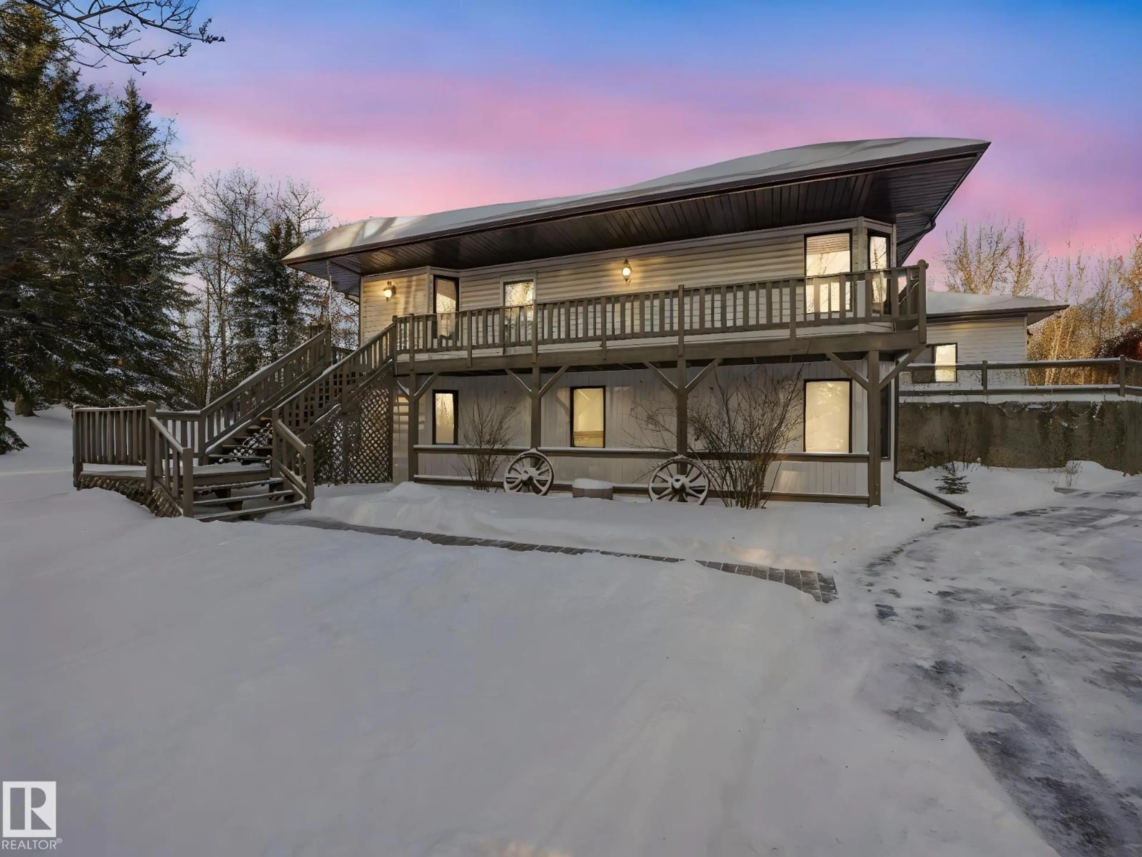 A pic from outside/outdoor area/front of a property/back of a property/a pic from drone, unknown for 73 23020 TWP ROAD 522, Rural Strathcona County Alberta T8B1H1