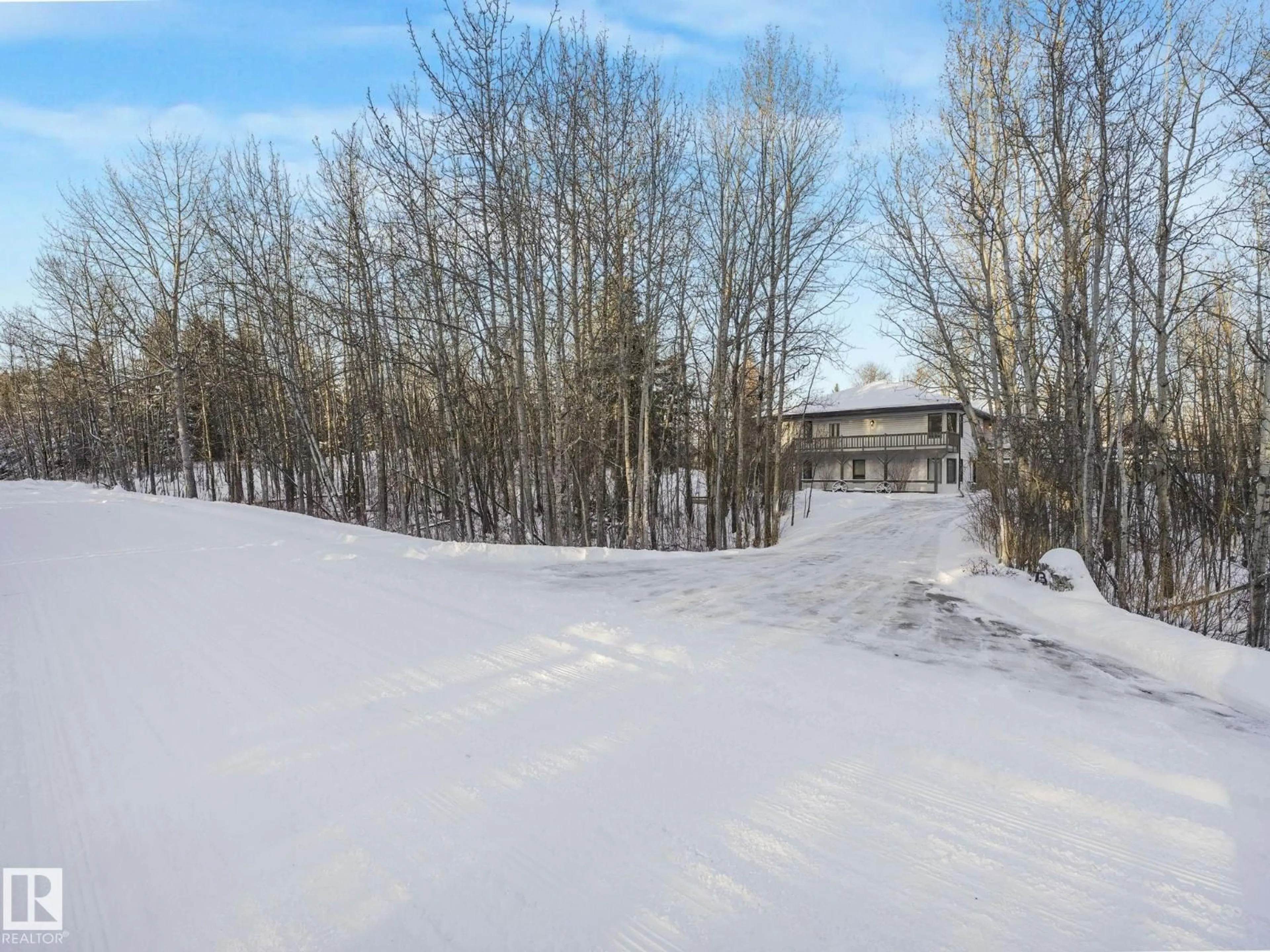 A pic from outside/outdoor area/front of a property/back of a property/a pic from drone, unknown for 73 23020 TWP ROAD 522, Rural Strathcona County Alberta T8B1H1