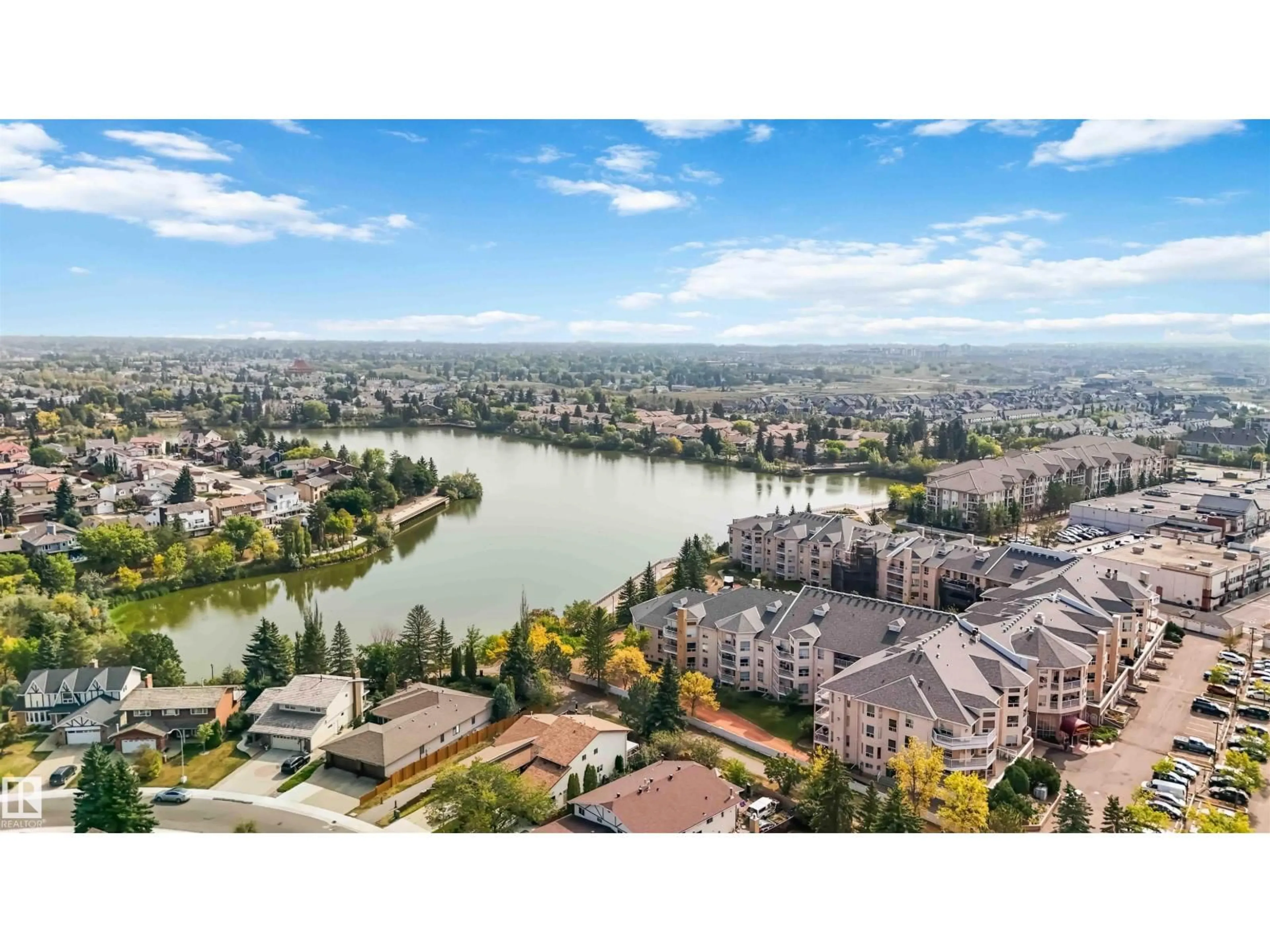 A pic from outside/outdoor area/front of a property/back of a property/a pic from drone, water/lake/river/ocean view for #312 - 15499 CASTLE DOWNS RD, Edmonton Alberta T5X5Y3