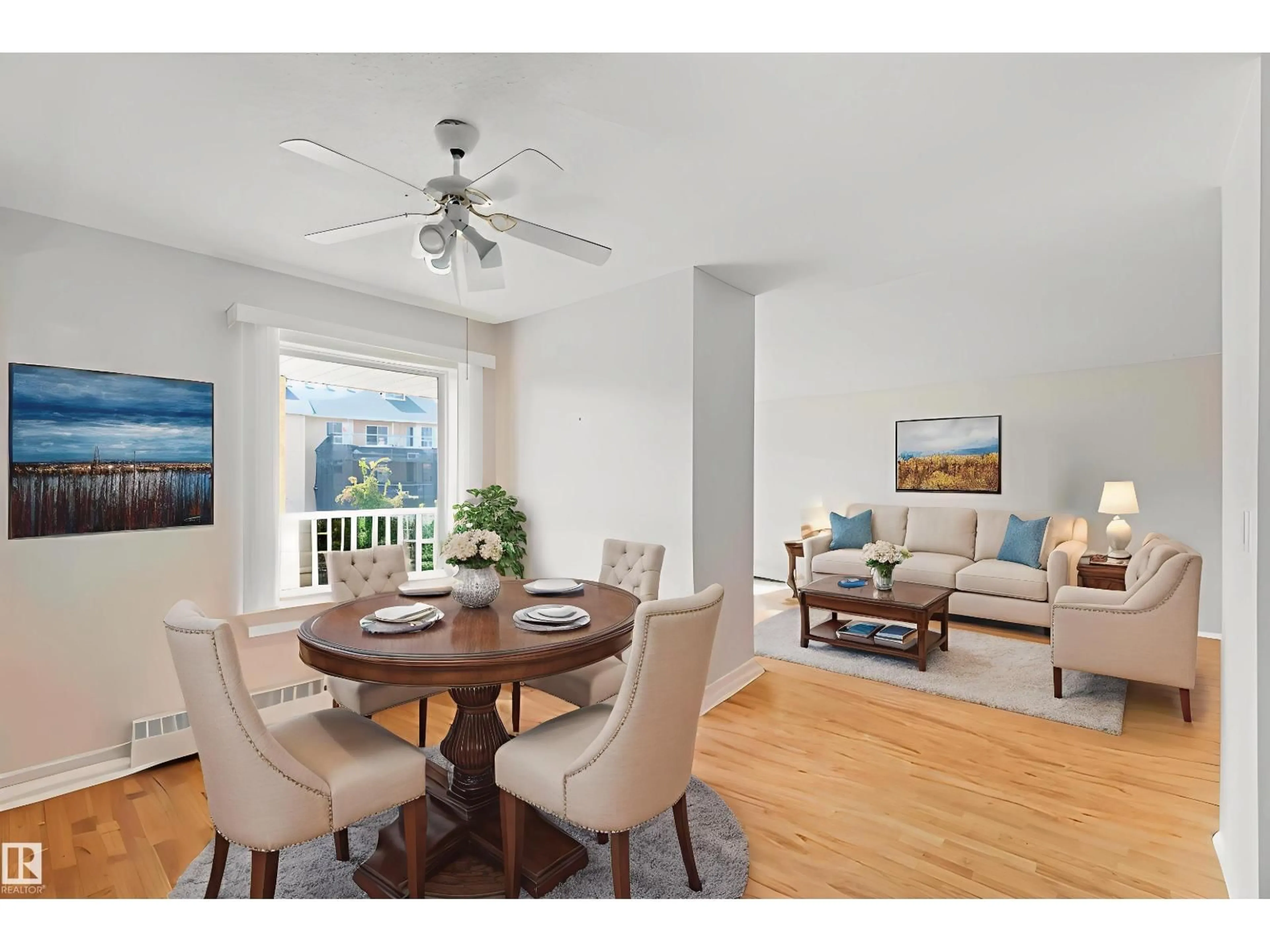 Living room with furniture, wood/laminate floor for #312 - 15499 CASTLE DOWNS RD, Edmonton Alberta T5X5Y3