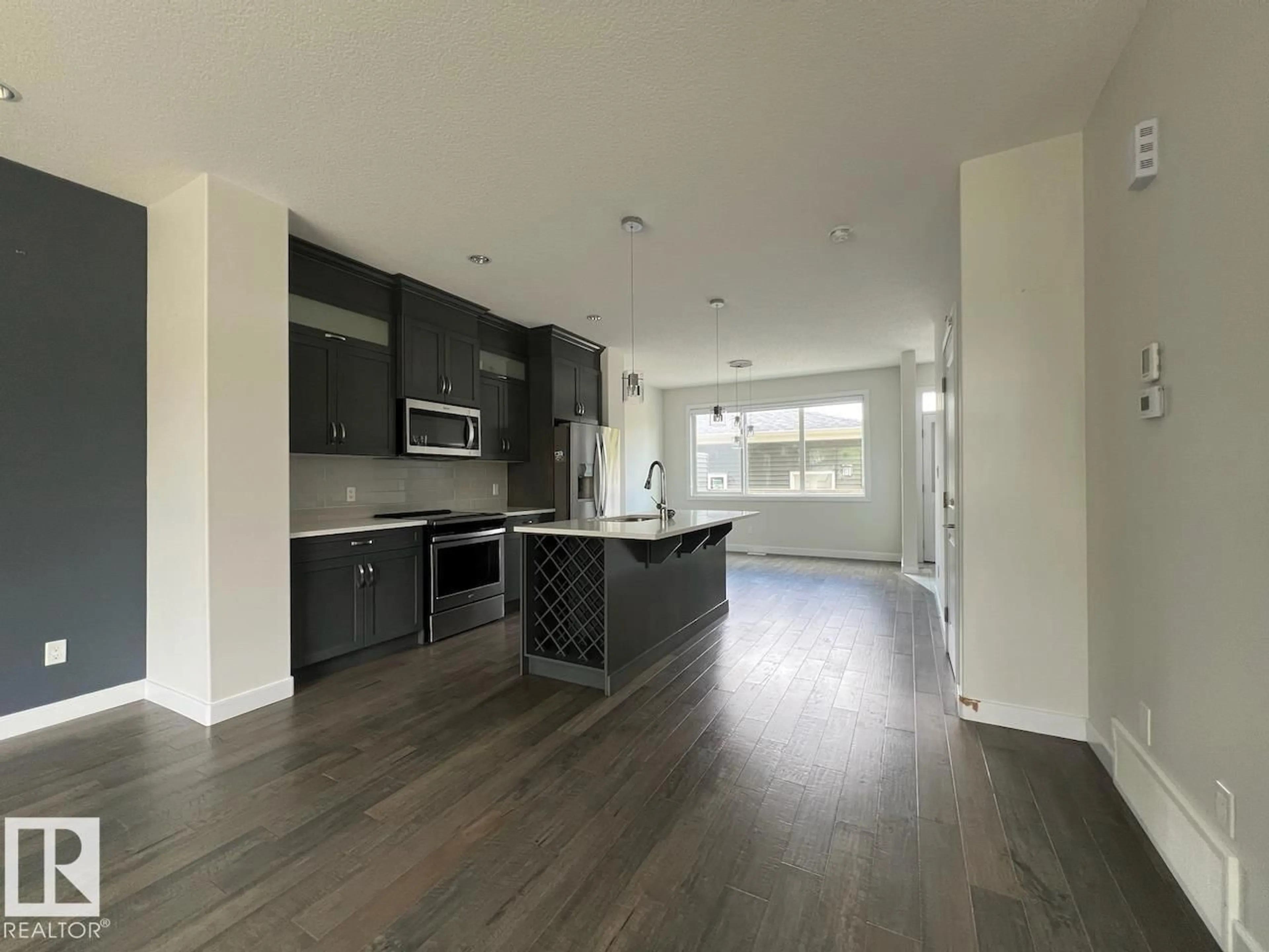 Open concept kitchen, unknown for 10574 62 AV, Edmonton Alberta T6H1M4