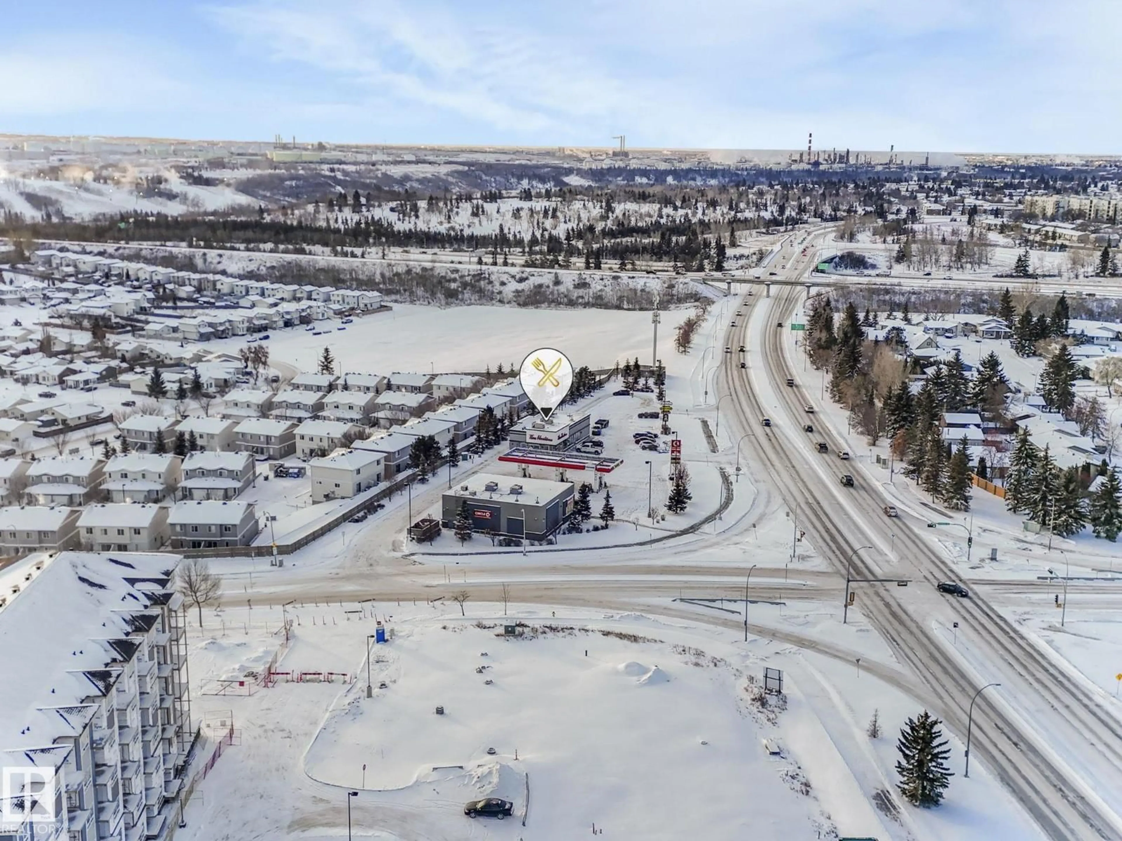 A pic from outside/outdoor area/front of a property/back of a property/a pic from drone, street for #407 - 592 HOOKE RD, Edmonton Alberta T5A5H2