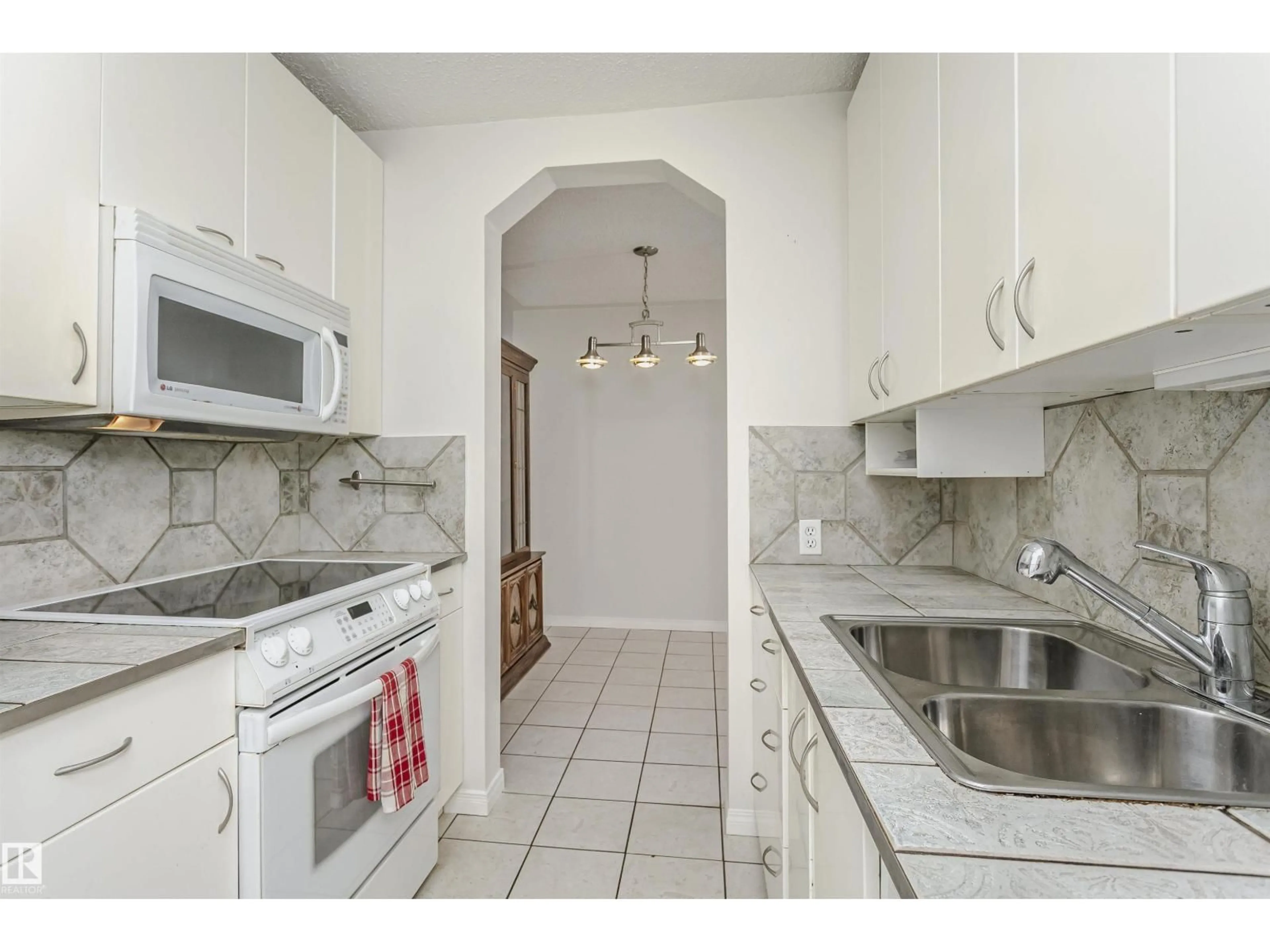 Standard kitchen, ceramic/tile floor for #302 - 5005 31 AV, Edmonton Alberta T6L6S6