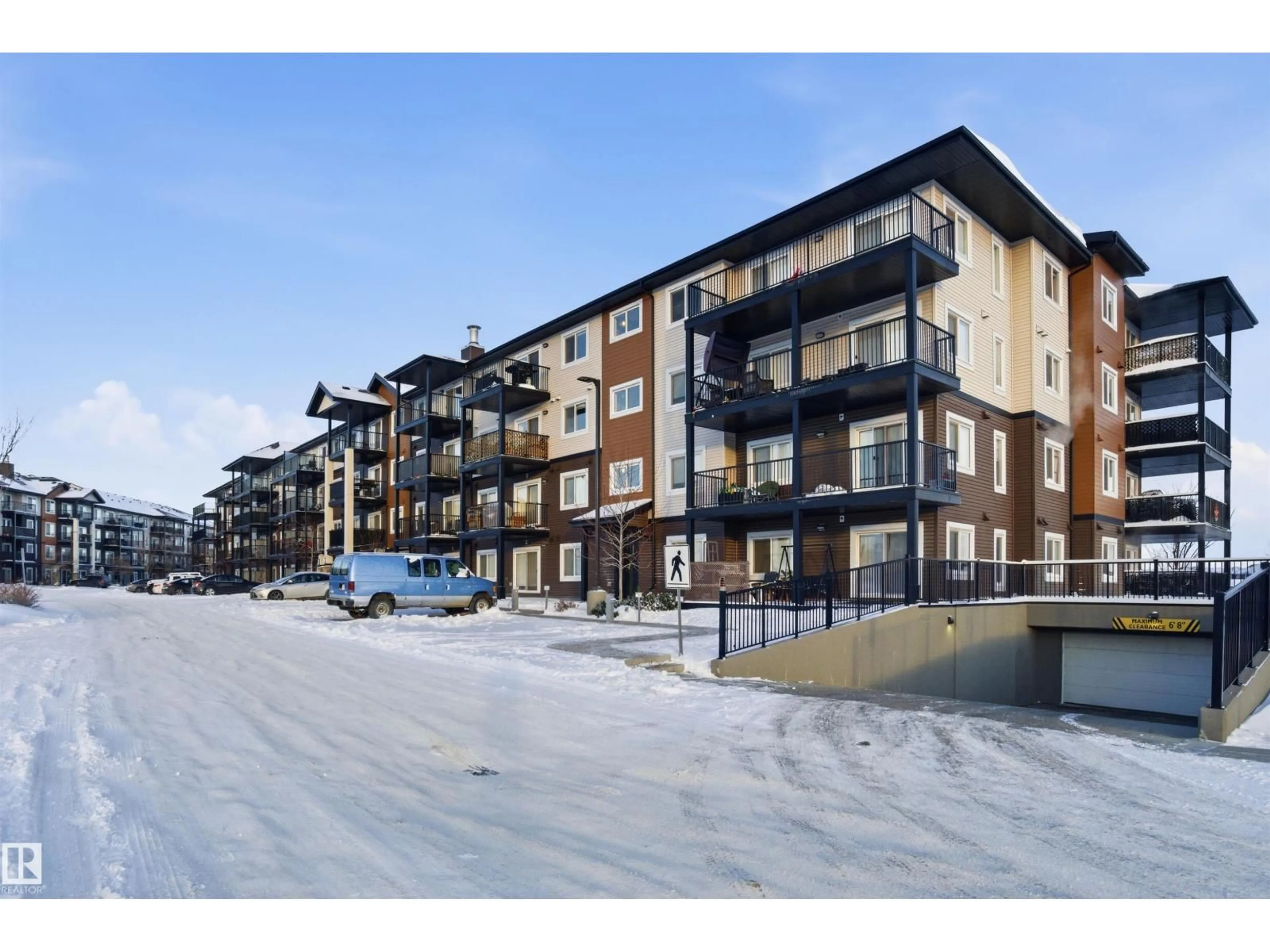 A pic from outside/outdoor area/front of a property/back of a property/a pic from drone, unknown for #427 - 148 EBBERS BV, Edmonton Alberta T5Y4A4