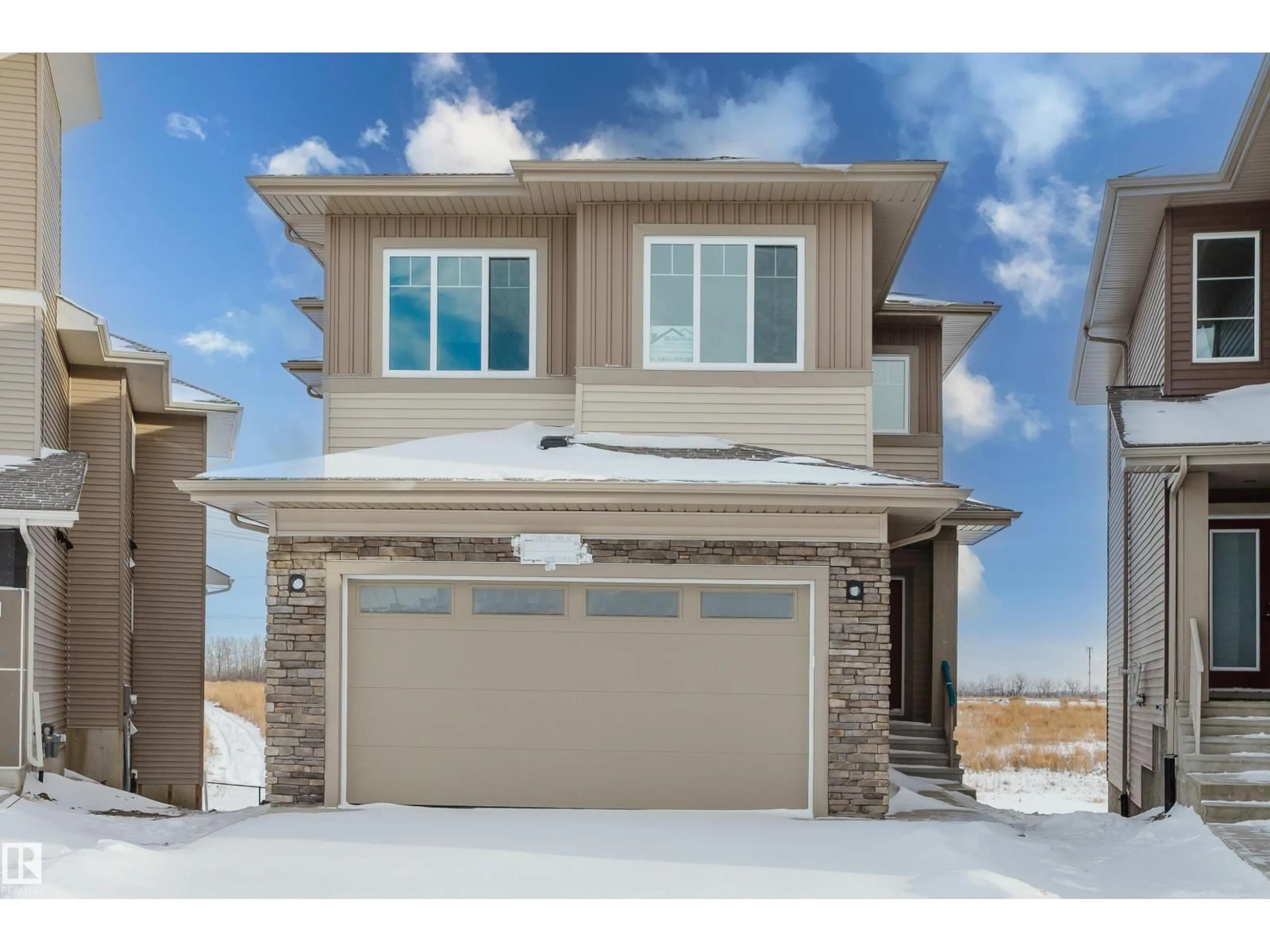 Home with vinyl exterior material, street for NW - 2835 188 ST, Edmonton Alberta T6M3C5