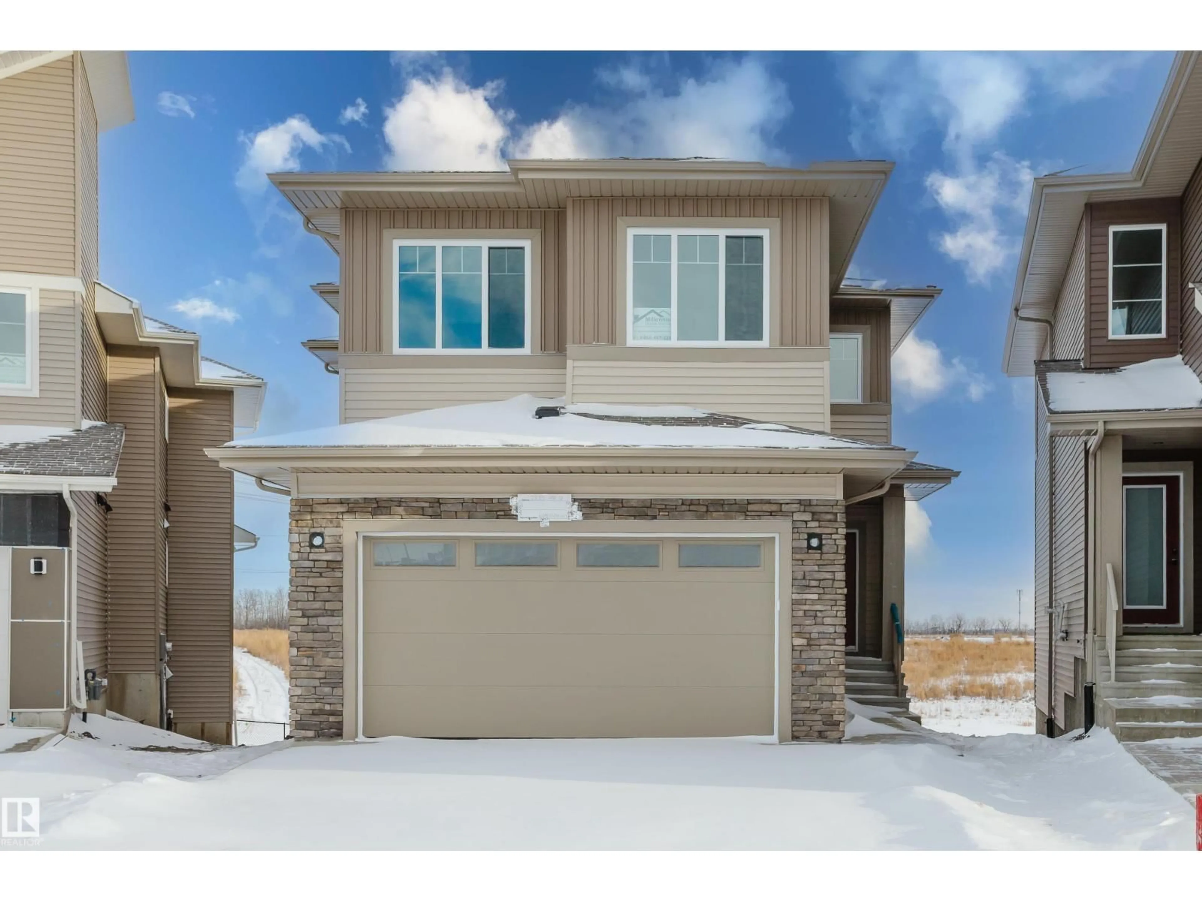Home with vinyl exterior material, street for NW - 2835 188 ST, Edmonton Alberta T6M3C5
