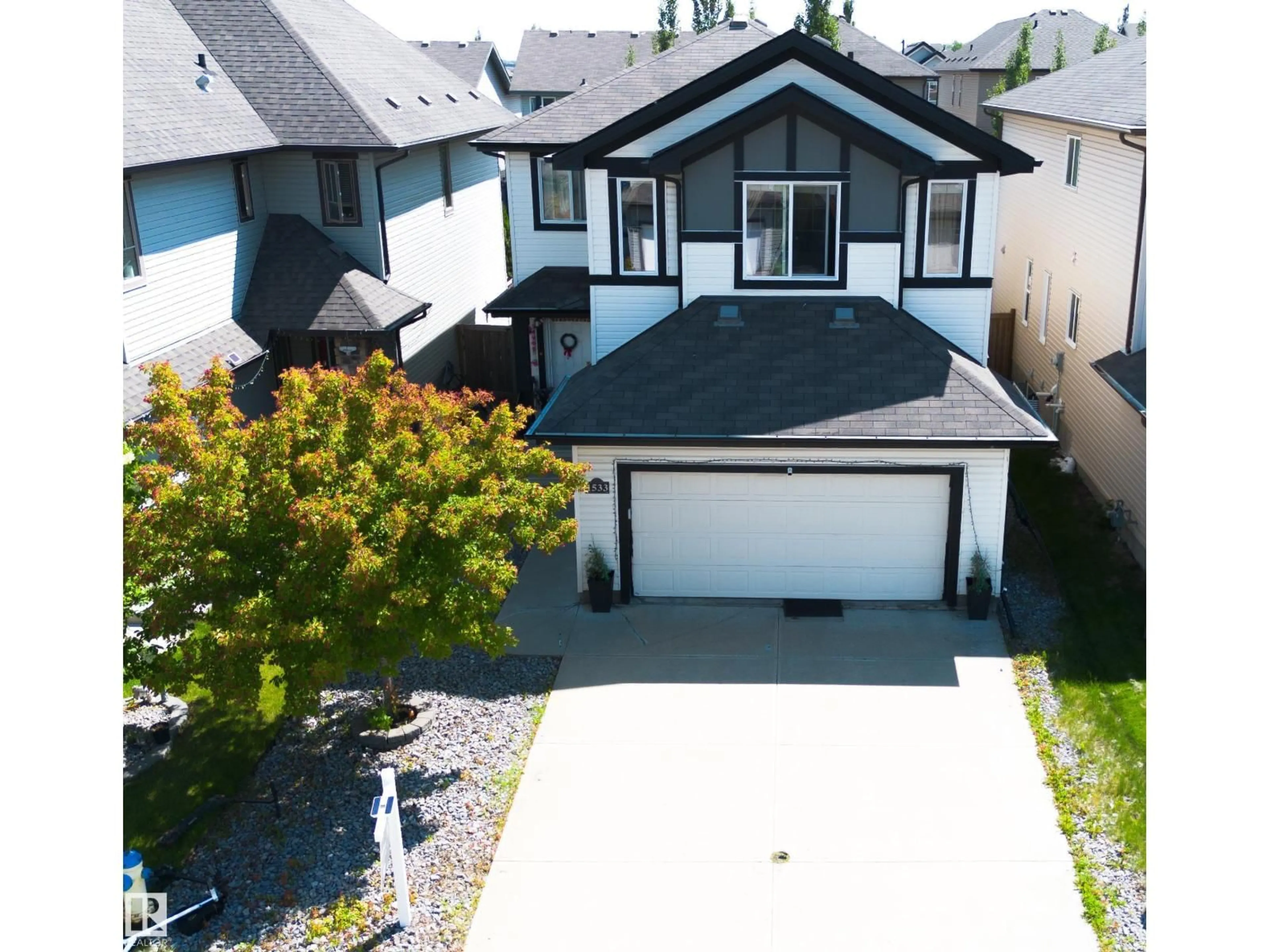 A pic from outside/outdoor area/front of a property/back of a property/a pic from drone, street for NW - 1533 36B AV, Edmonton Alberta T6T0M4