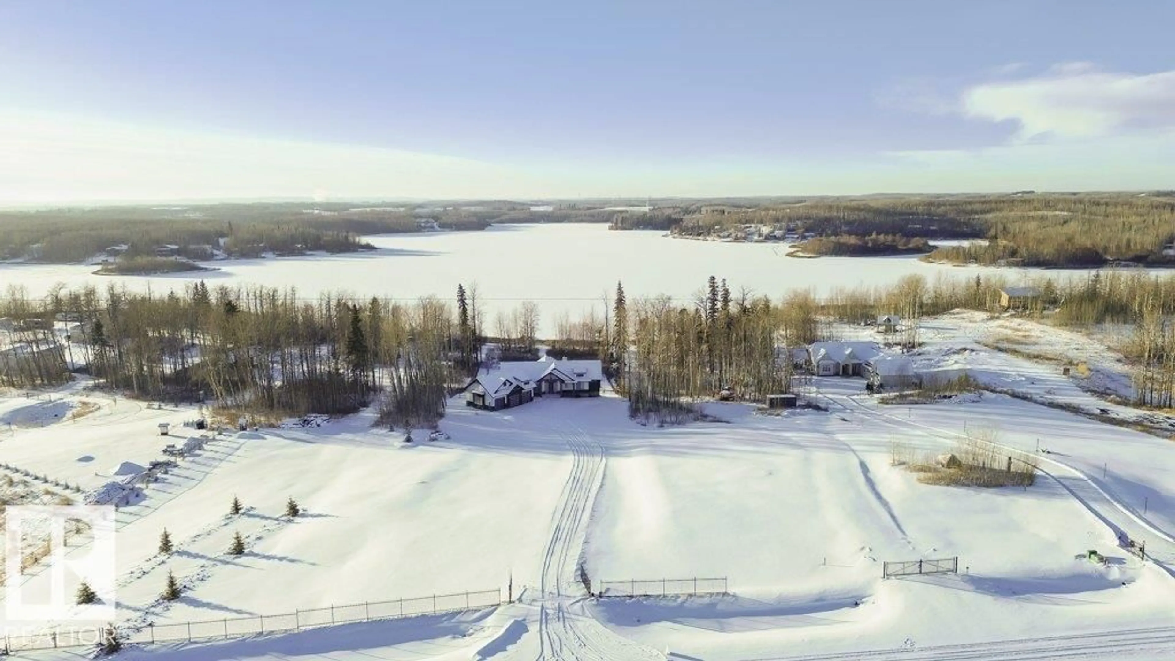 A pic from outside/outdoor area/front of a property/back of a property/a pic from drone, water/lake/river/ocean view for 42 - 2307 TWP ROAD 522, Rural Parkland County Alberta T7Y3L7