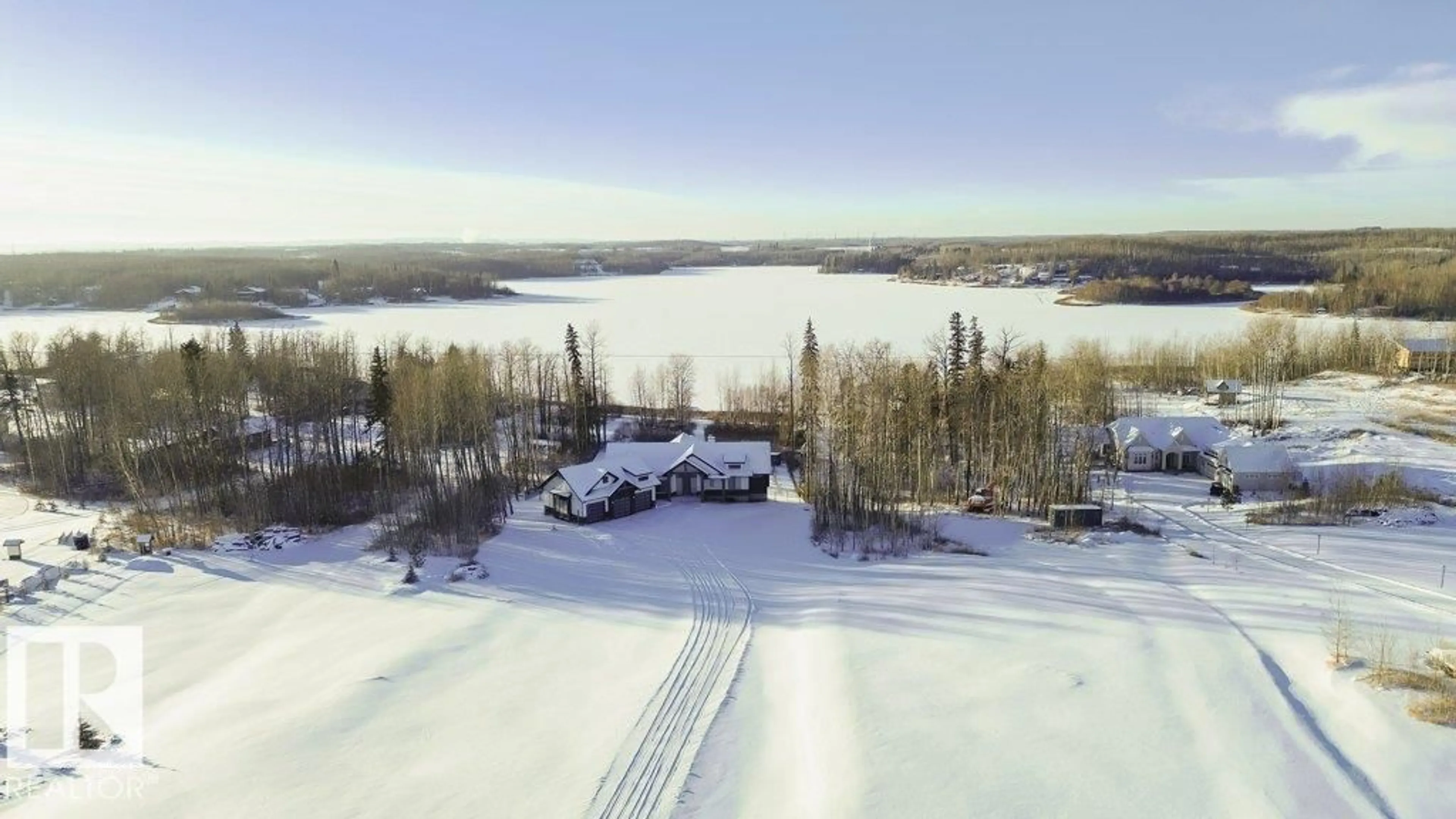A pic from outside/outdoor area/front of a property/back of a property/a pic from drone, water/lake/river/ocean view for 42 - 2307 TWP ROAD 522, Rural Parkland County Alberta T7Y3L7