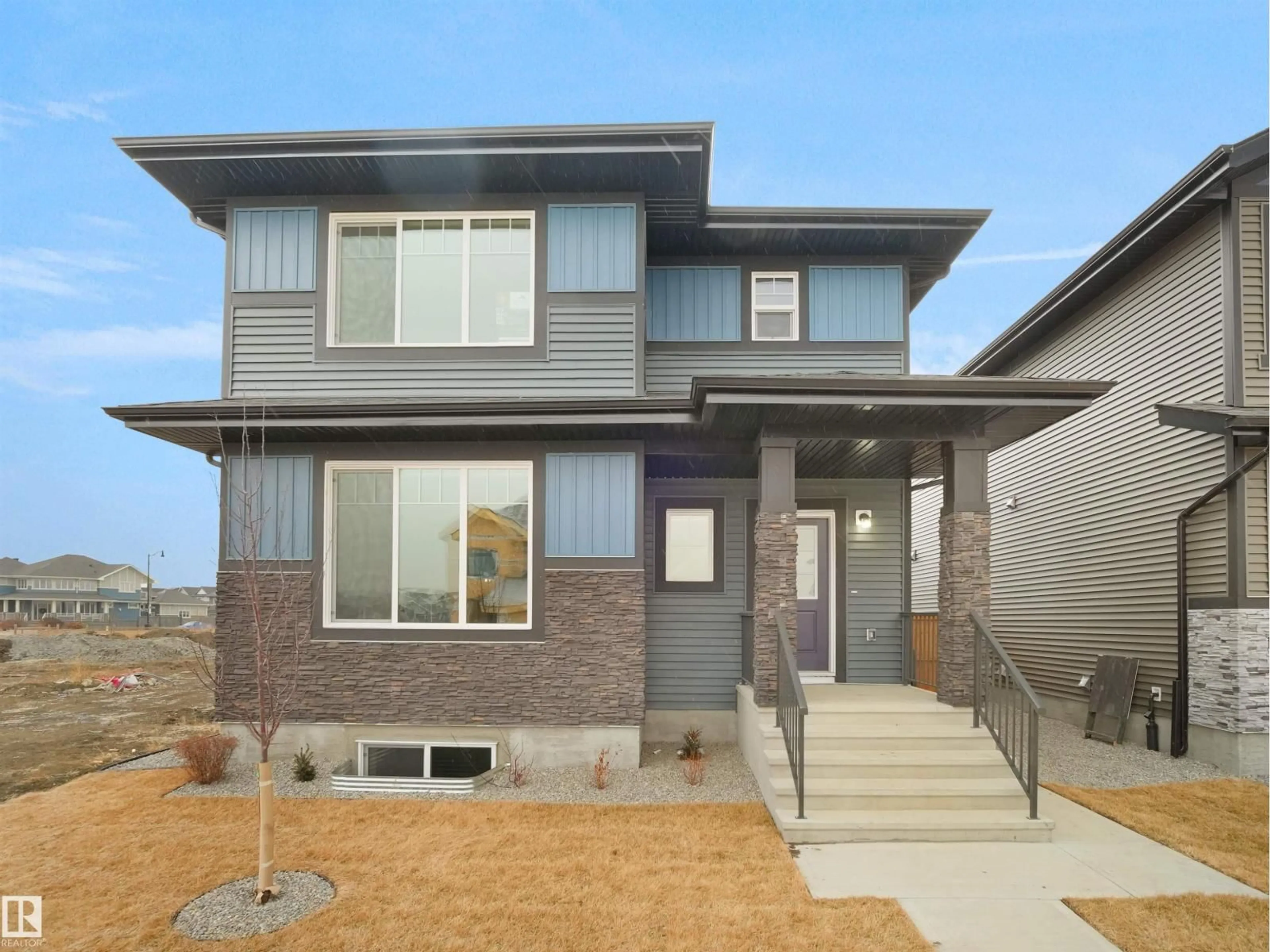 Home with brick exterior material, street for 3272 DALLAS SCHMIDT DR, Edmonton Alberta T5E6Z9