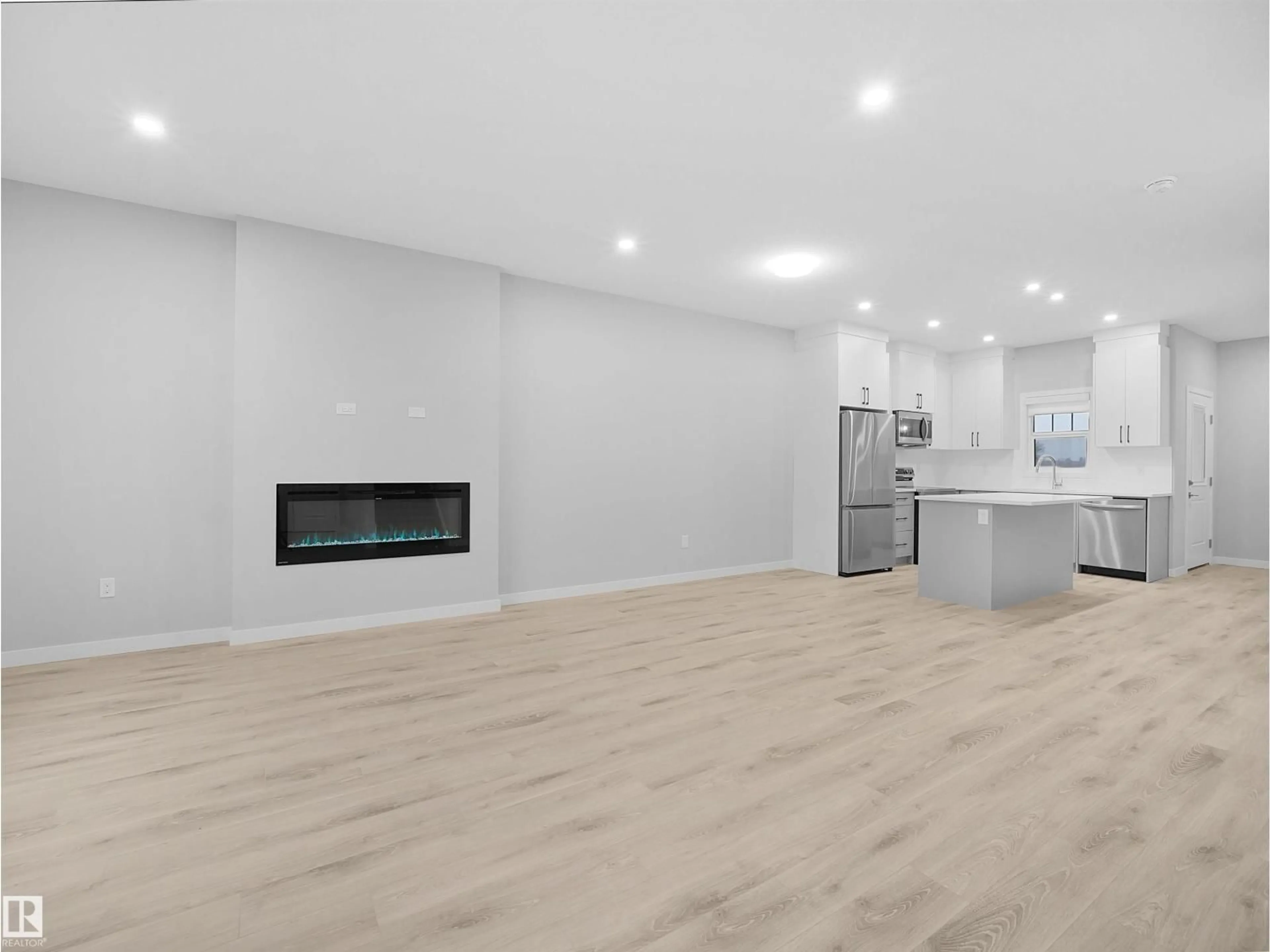 Open concept kitchen, wood/laminate floor for 3272 DALLAS SCHMIDT DR, Edmonton Alberta T5E6Z9