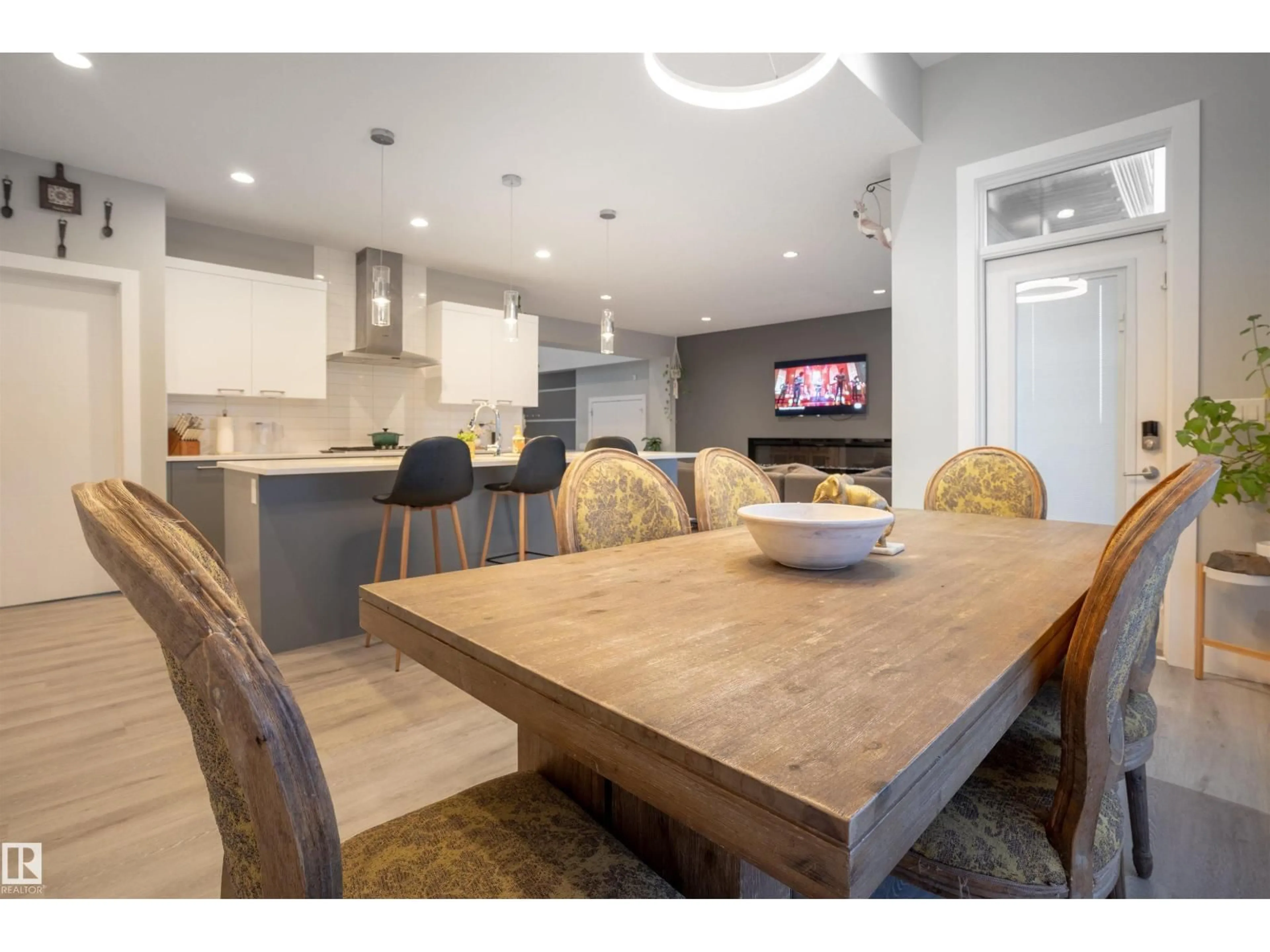 Open concept kitchen, wood/laminate floor for 2118 CAVANAGH DR, Edmonton Alberta T6W4G1