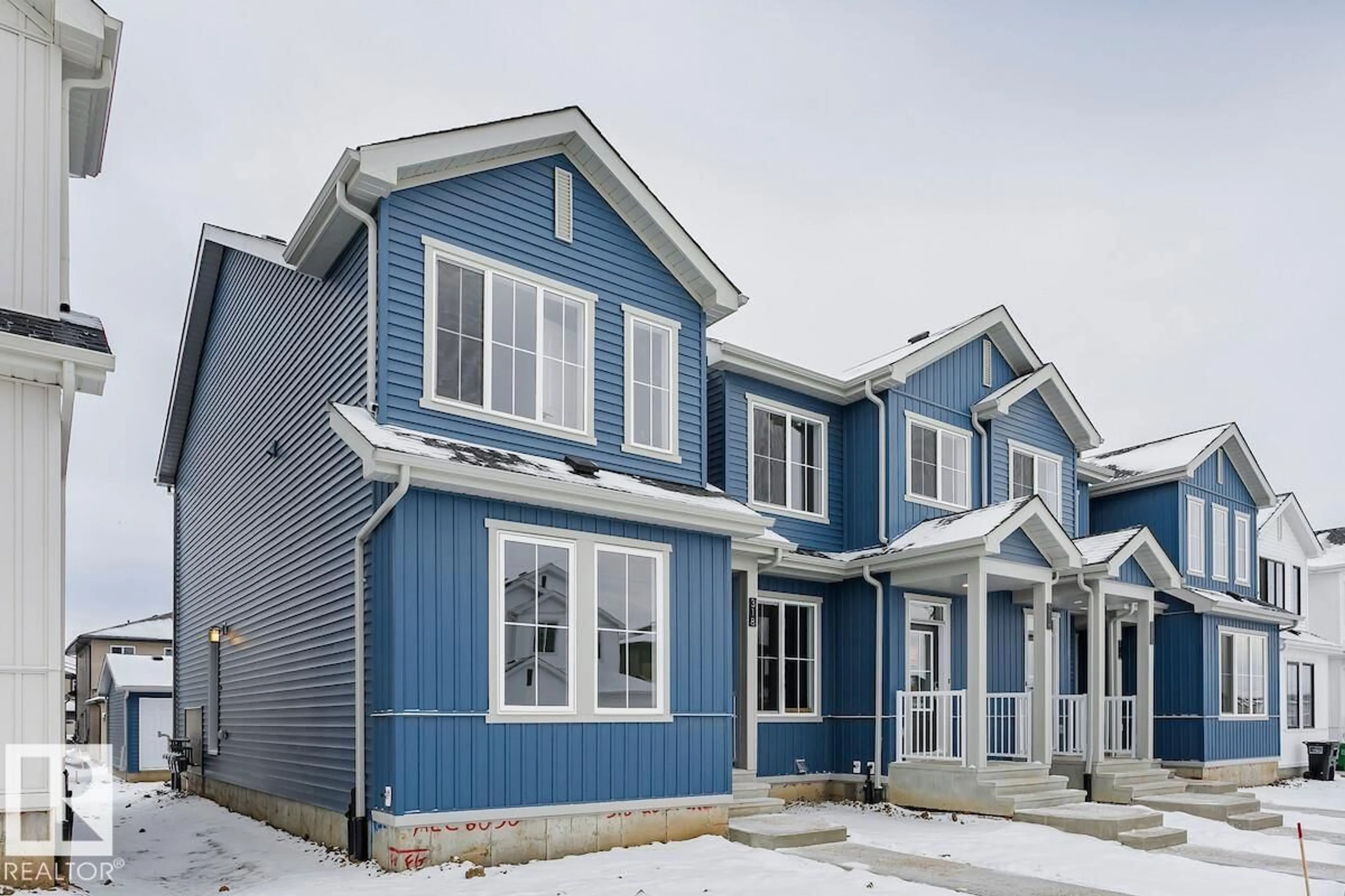 Home with vinyl exterior material, street for 318 26 ST, Edmonton Alberta T6X3J1
