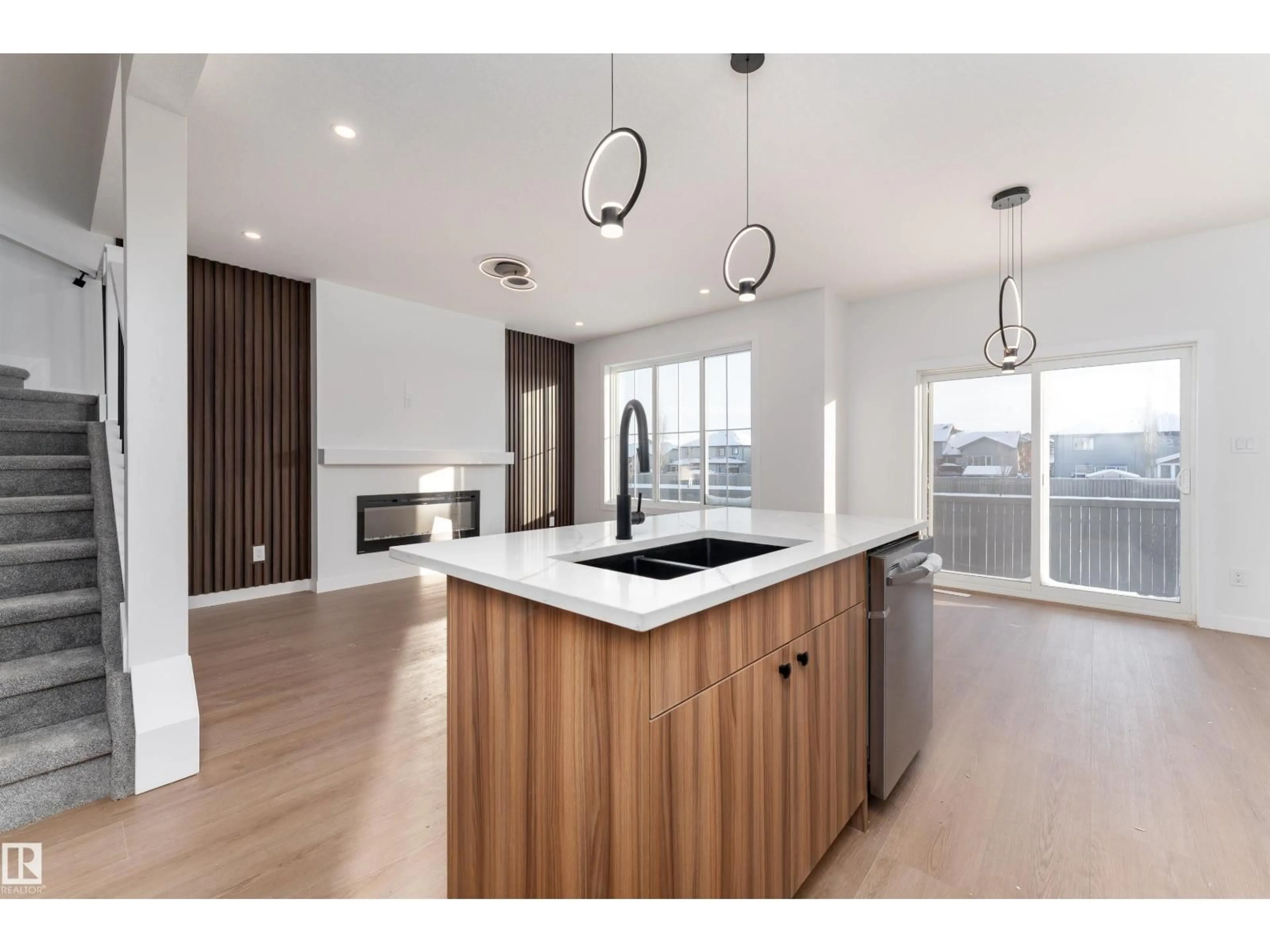 Open concept kitchen, wood/laminate floor for 73 ELLIOT WD, Fort Saskatchewan Alberta T8L1R8