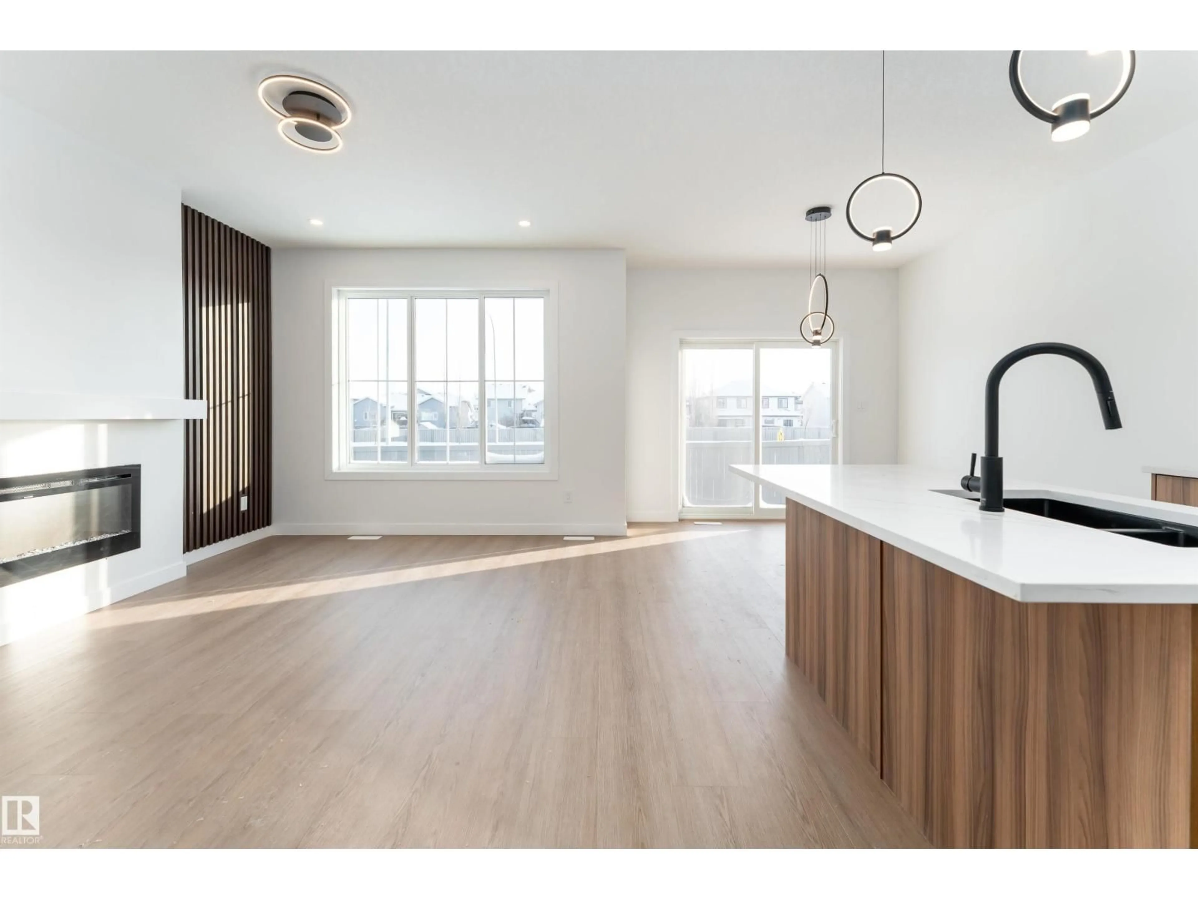 Open concept kitchen, wood/laminate floor for 73 ELLIOT WD, Fort Saskatchewan Alberta T8L1R8