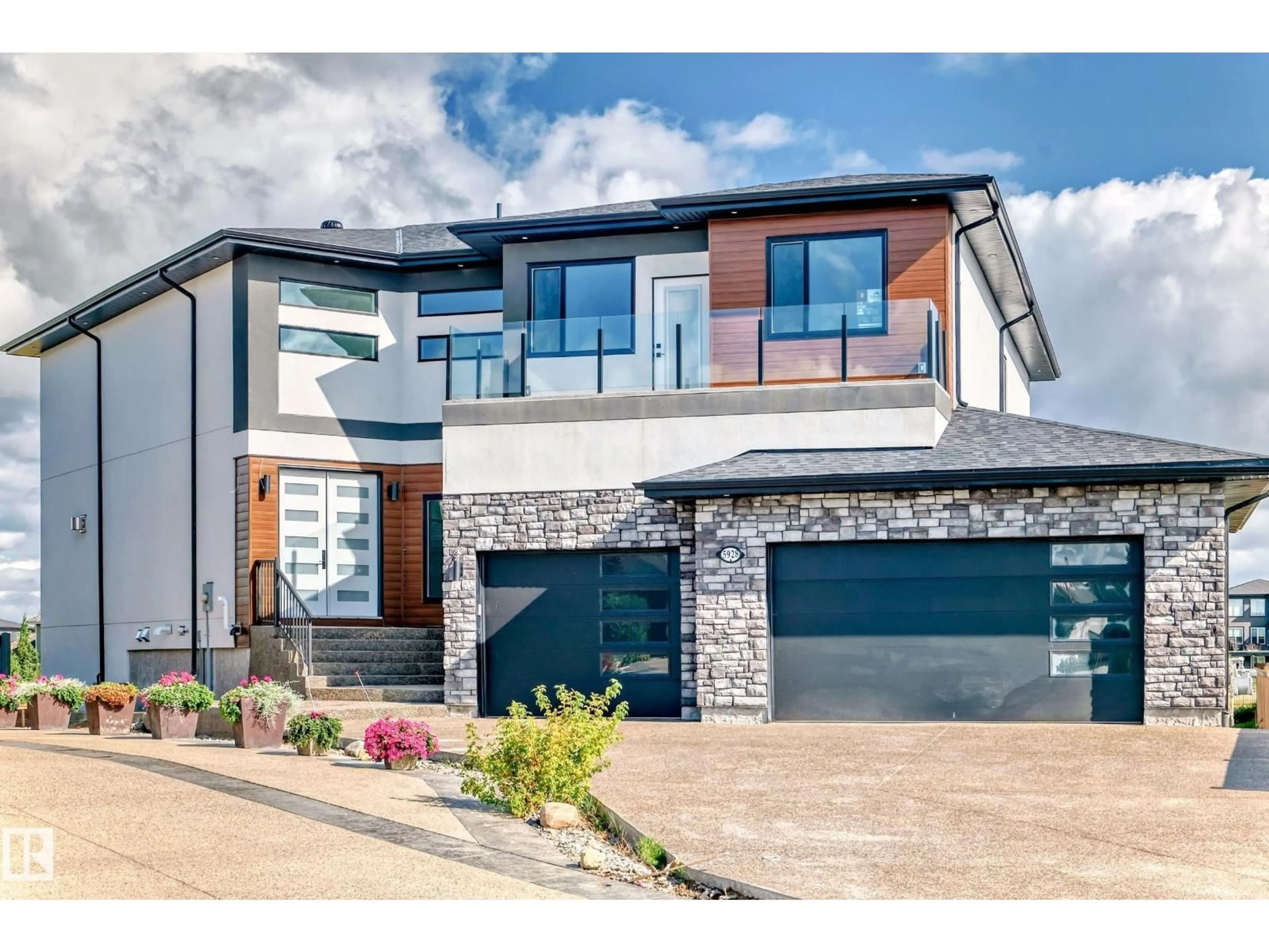 Home with brick exterior material, street for NE - 5928 32 ST, Rural Leduc County Alberta T4X0X4