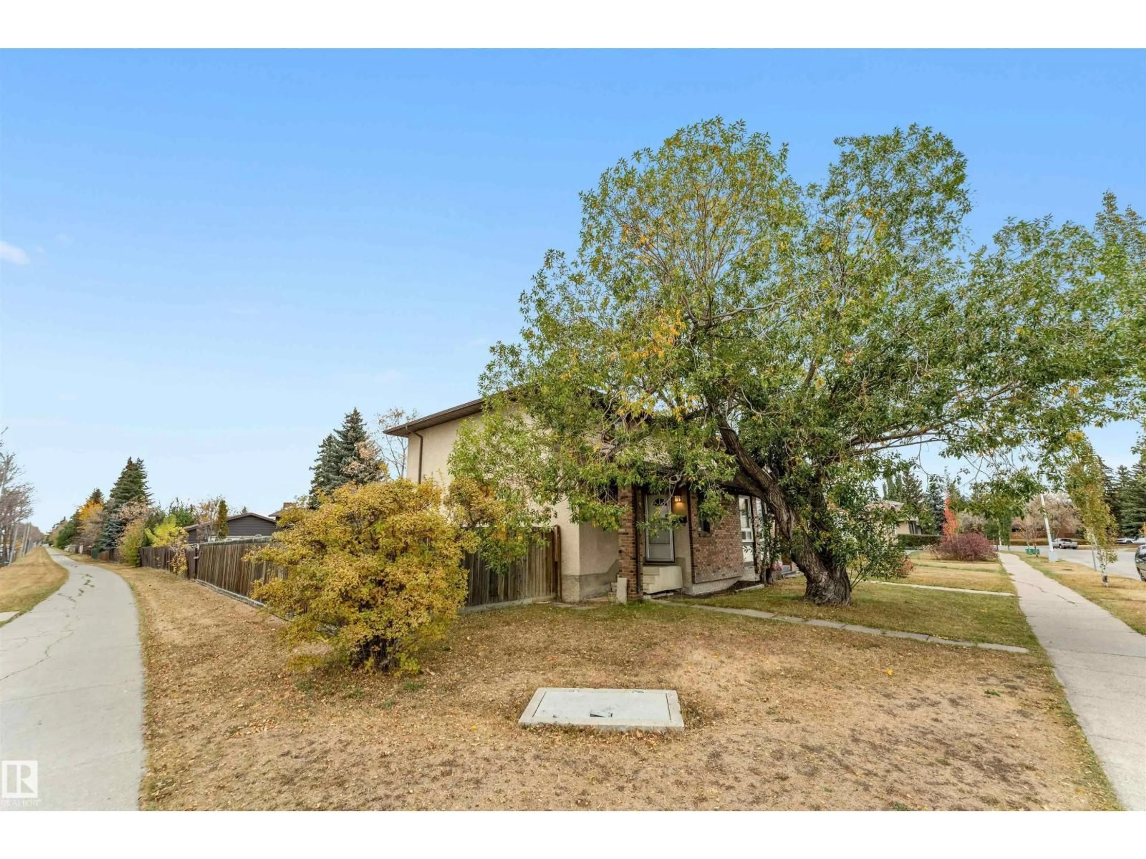 A pic from outside/outdoor area/front of a property/back of a property/a pic from drone, unknown for NW - 15304 121 ST, Edmonton Alberta T5X4K4