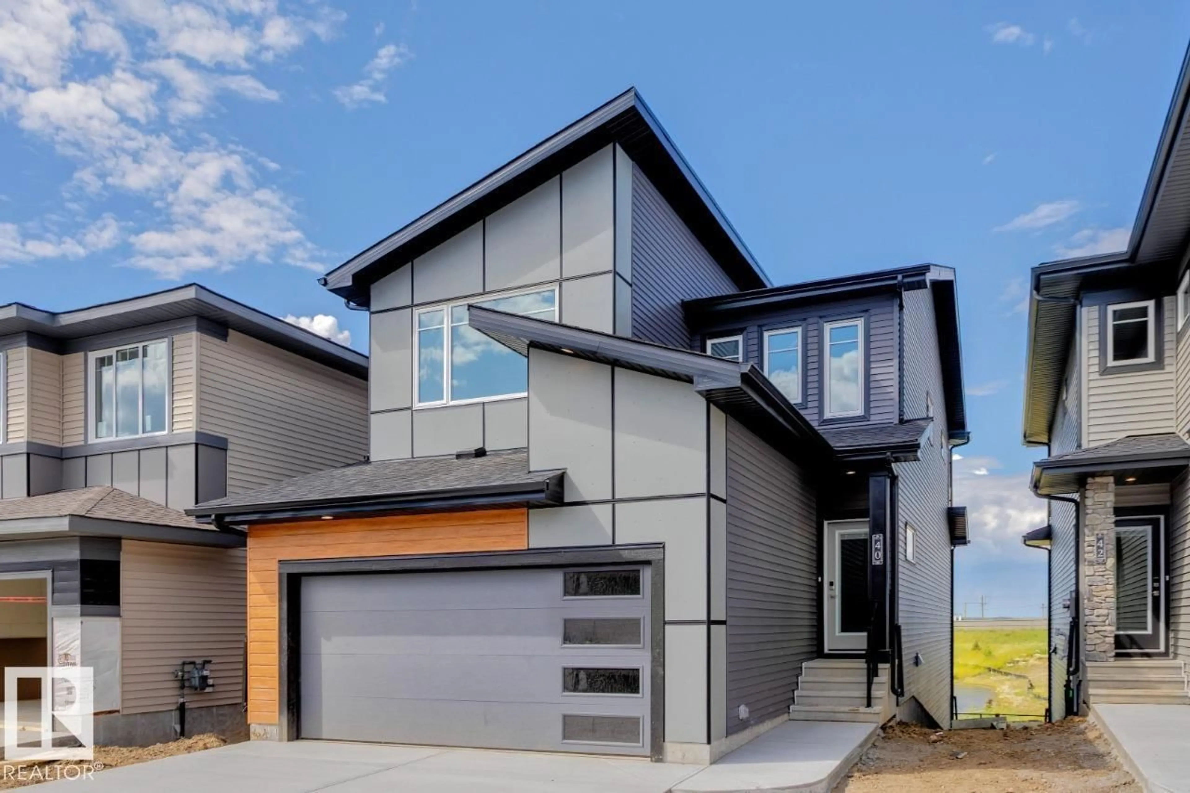 Home with vinyl exterior material, street for 40 GAMBEL LO, Spruce Grove Alberta T7X0C9