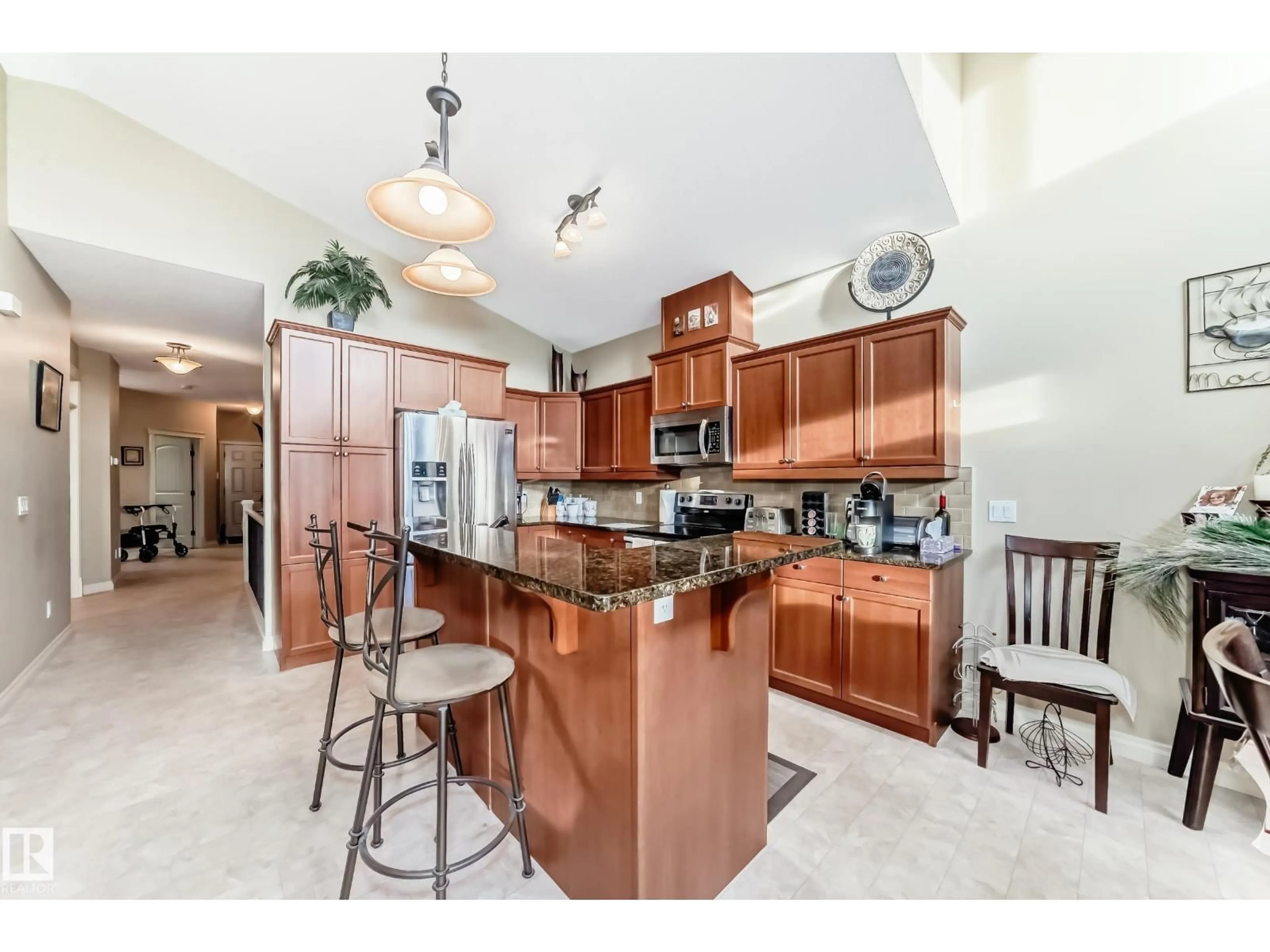 Open concept kitchen, ceramic/tile floor for #31 - 1407 GLASTONBURY BV, Edmonton Alberta T5T3W3