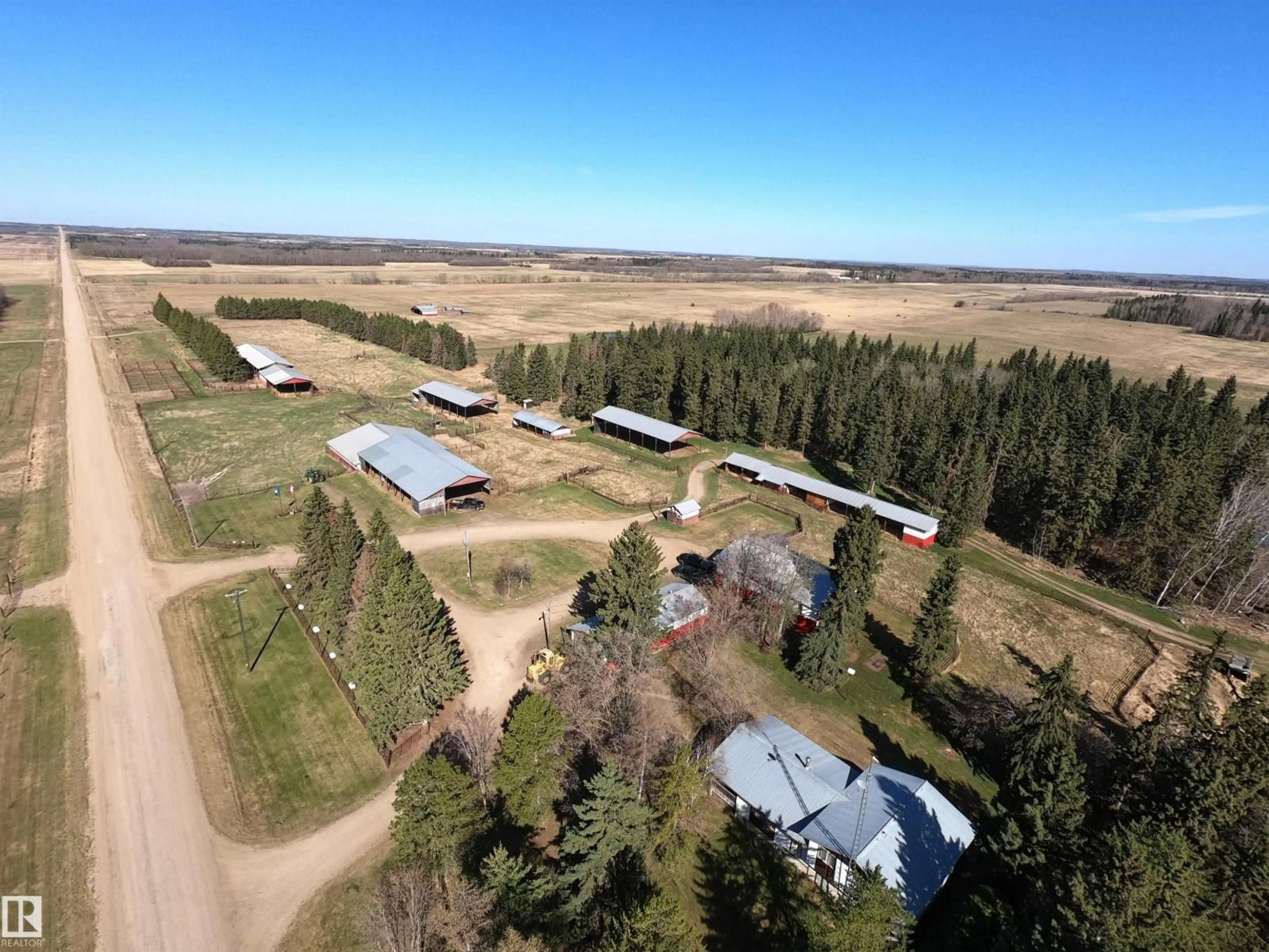A pic from outside/outdoor area/front of a property/back of a property/a pic from drone, unknown for 10018 TWP RD 612, Rural St. Paul County Alberta T0A2K0