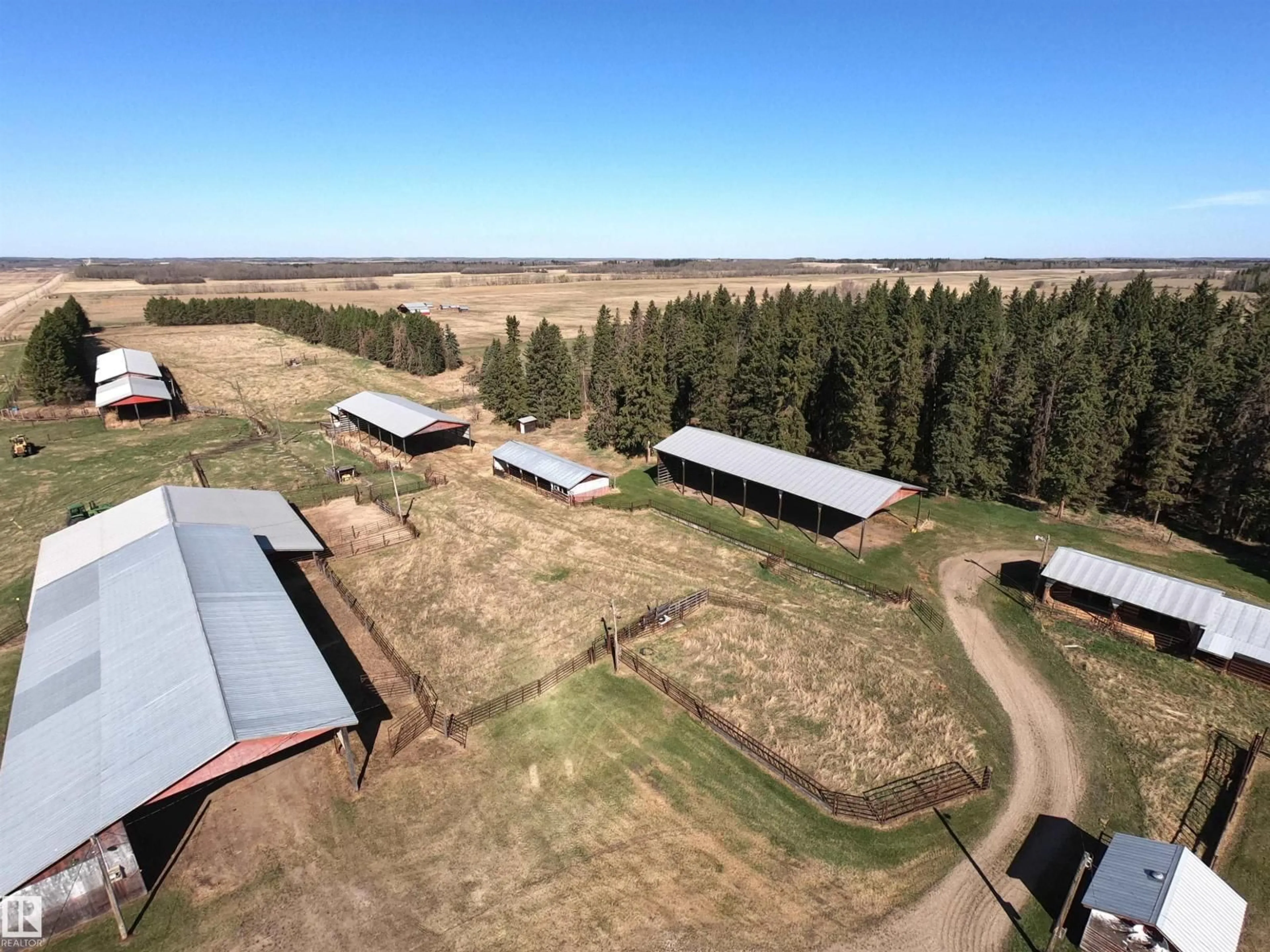 A pic from outside/outdoor area/front of a property/back of a property/a pic from drone, building for 10018 TWP RD 612, Rural St. Paul County Alberta T0A2K0
