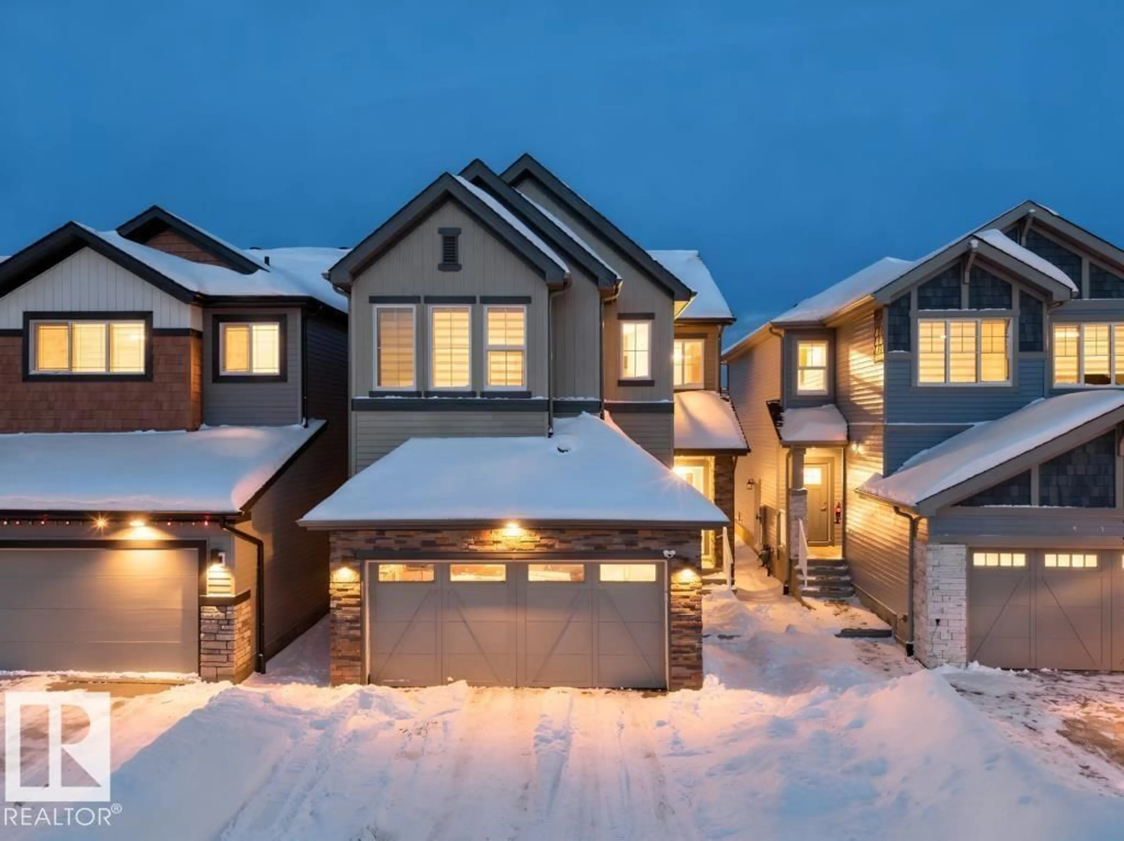 Home with brick exterior material, street for 7020 177 AV, Edmonton Alberta T5Z0W8