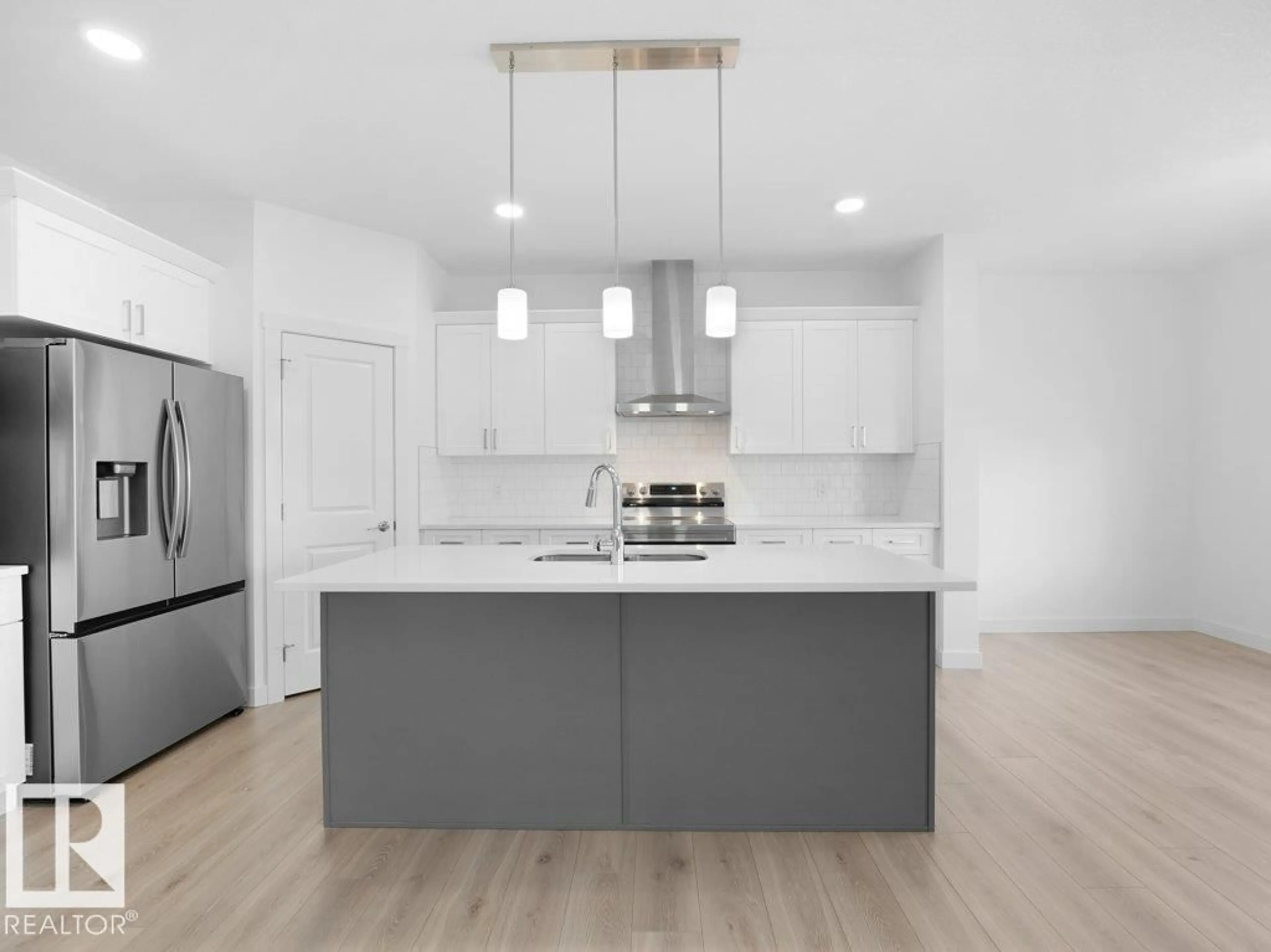 Contemporary kitchen, wood/laminate floor for 7020 177 AV, Edmonton Alberta T5Z0W8