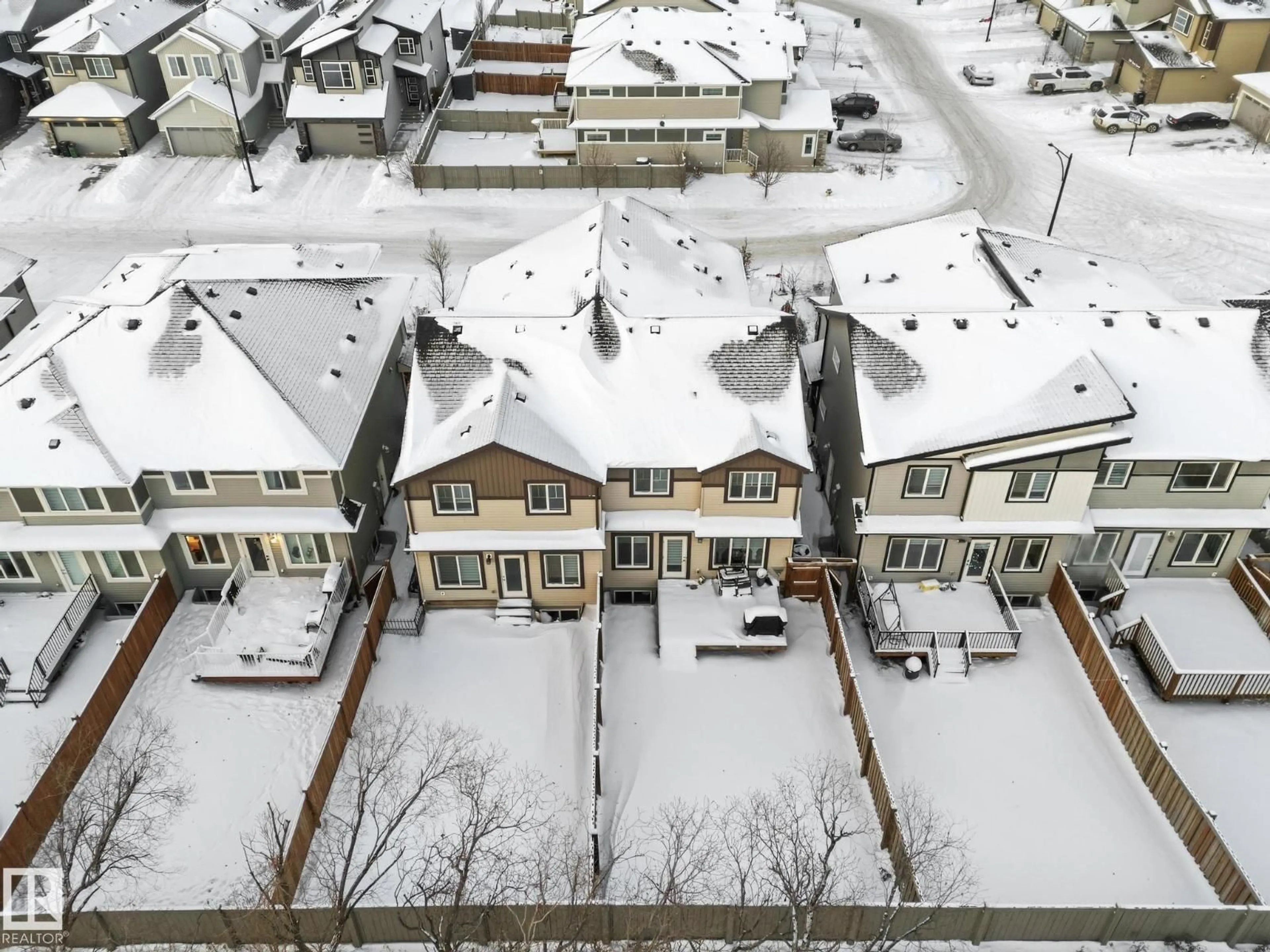 A pic from outside/outdoor area/front of a property/back of a property/a pic from drone, street for 7438 CHIVERS CR, Edmonton Alberta T6W4M2