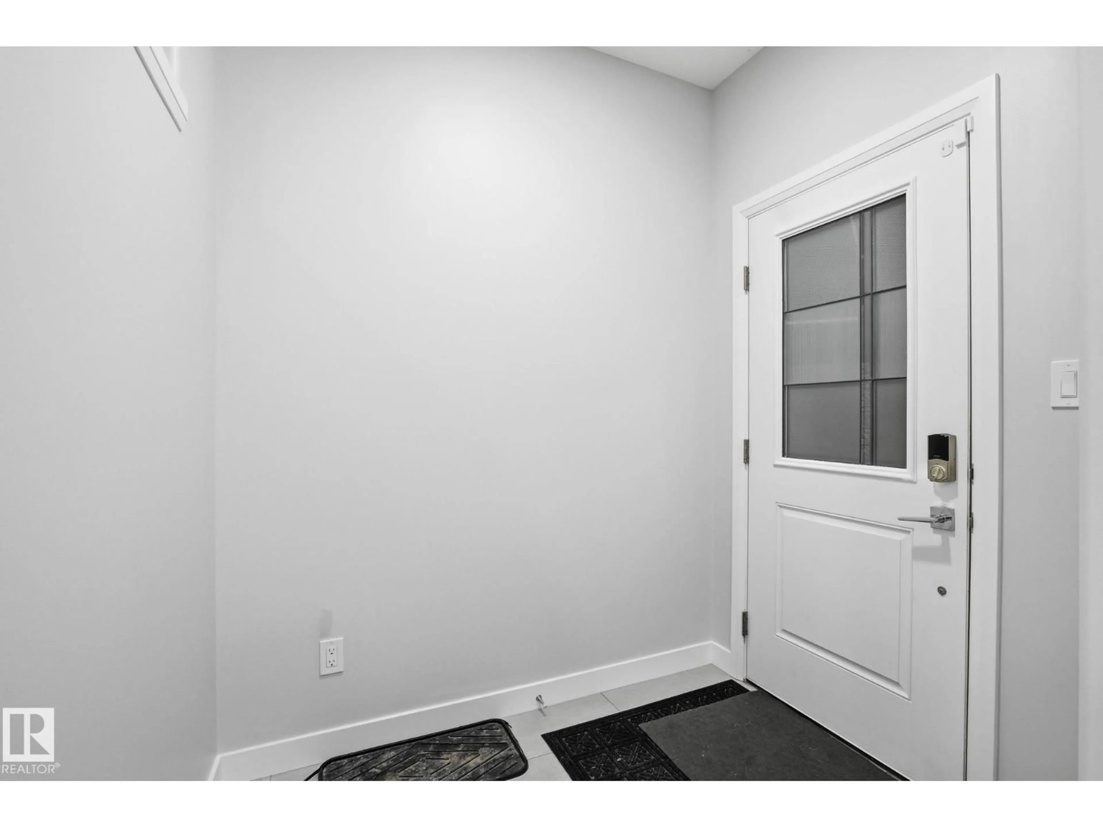 Indoor entryway for 7438 CHIVERS CR, Edmonton Alberta T6W4M2