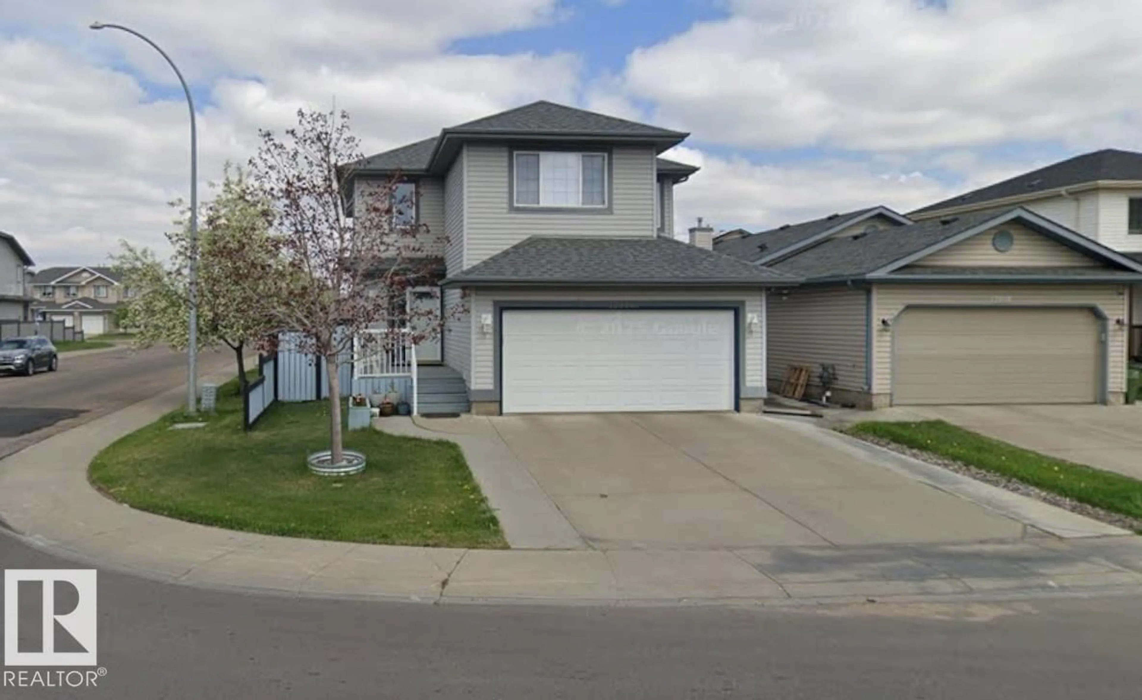 Home with vinyl exterior material, street for 12944 162 AV, Edmonton Alberta T6V1V5