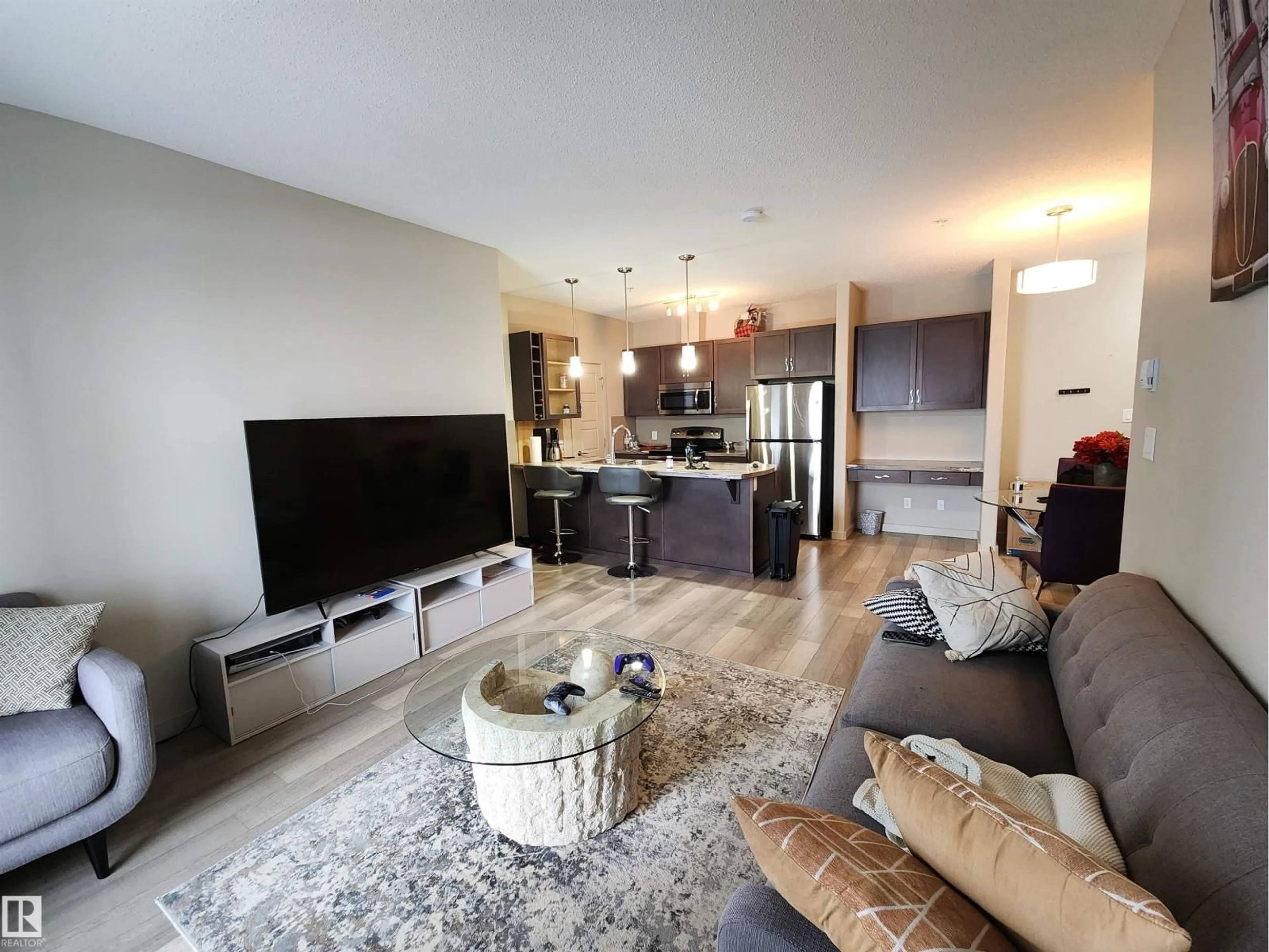 Living room with furniture, unknown for 403 - 1004 ROSENTHAL BV, Edmonton Alberta T5T5X9