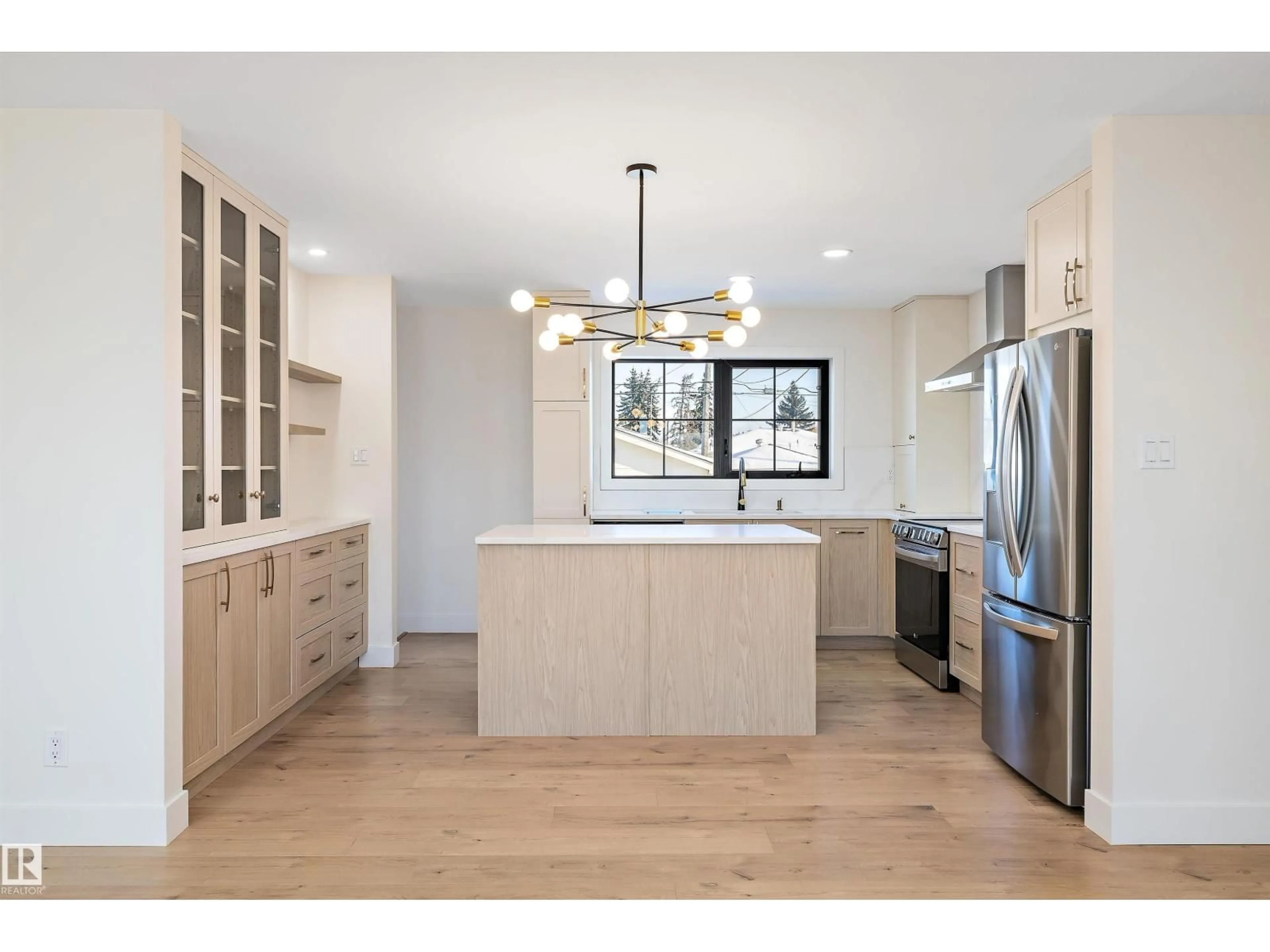 Open concept kitchen, wood/laminate floor for 13515 67 ST, Edmonton Alberta T5C0C6