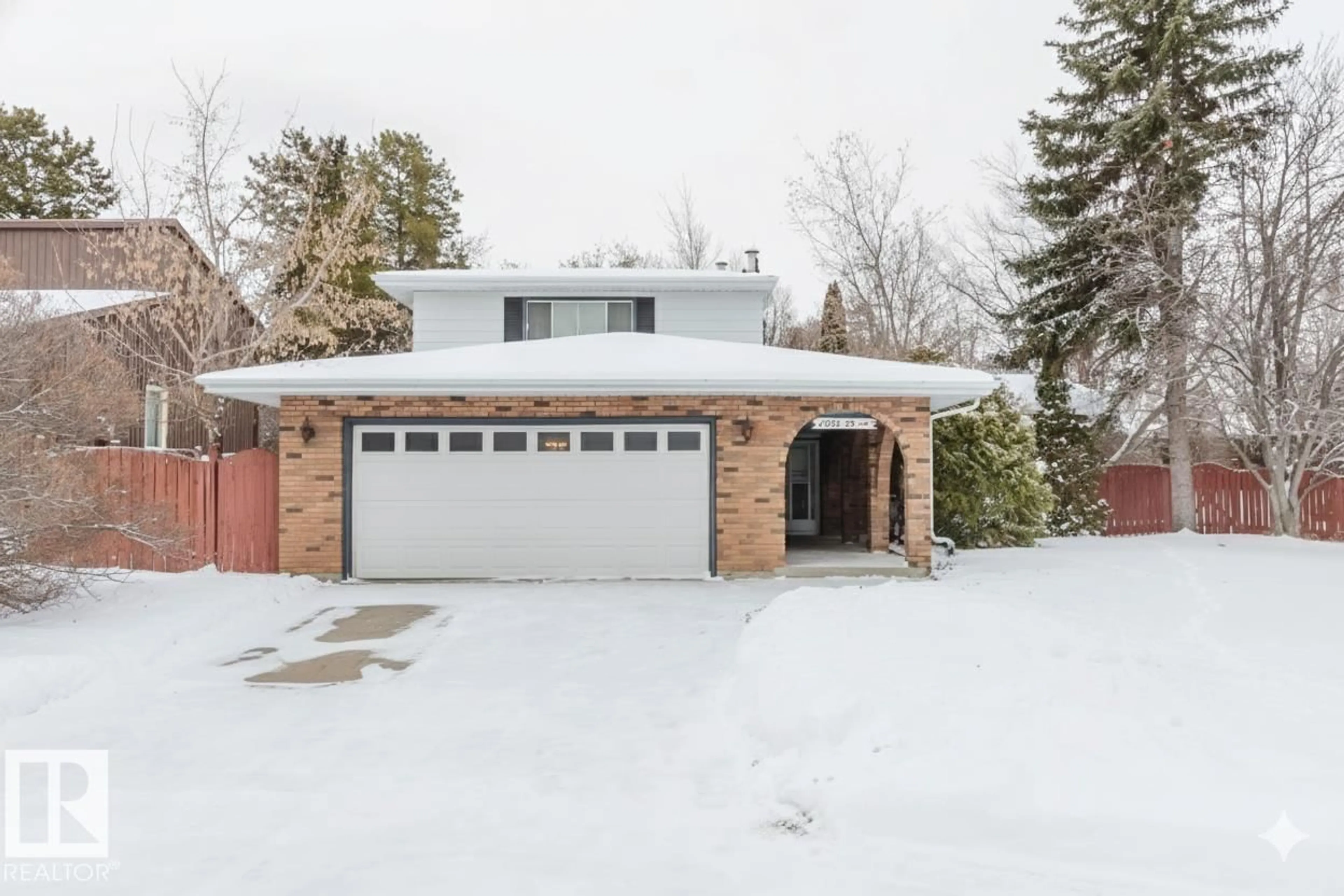 Home with brick exterior material, street for NW - 11615 24 AV, Edmonton Alberta T6J3R6