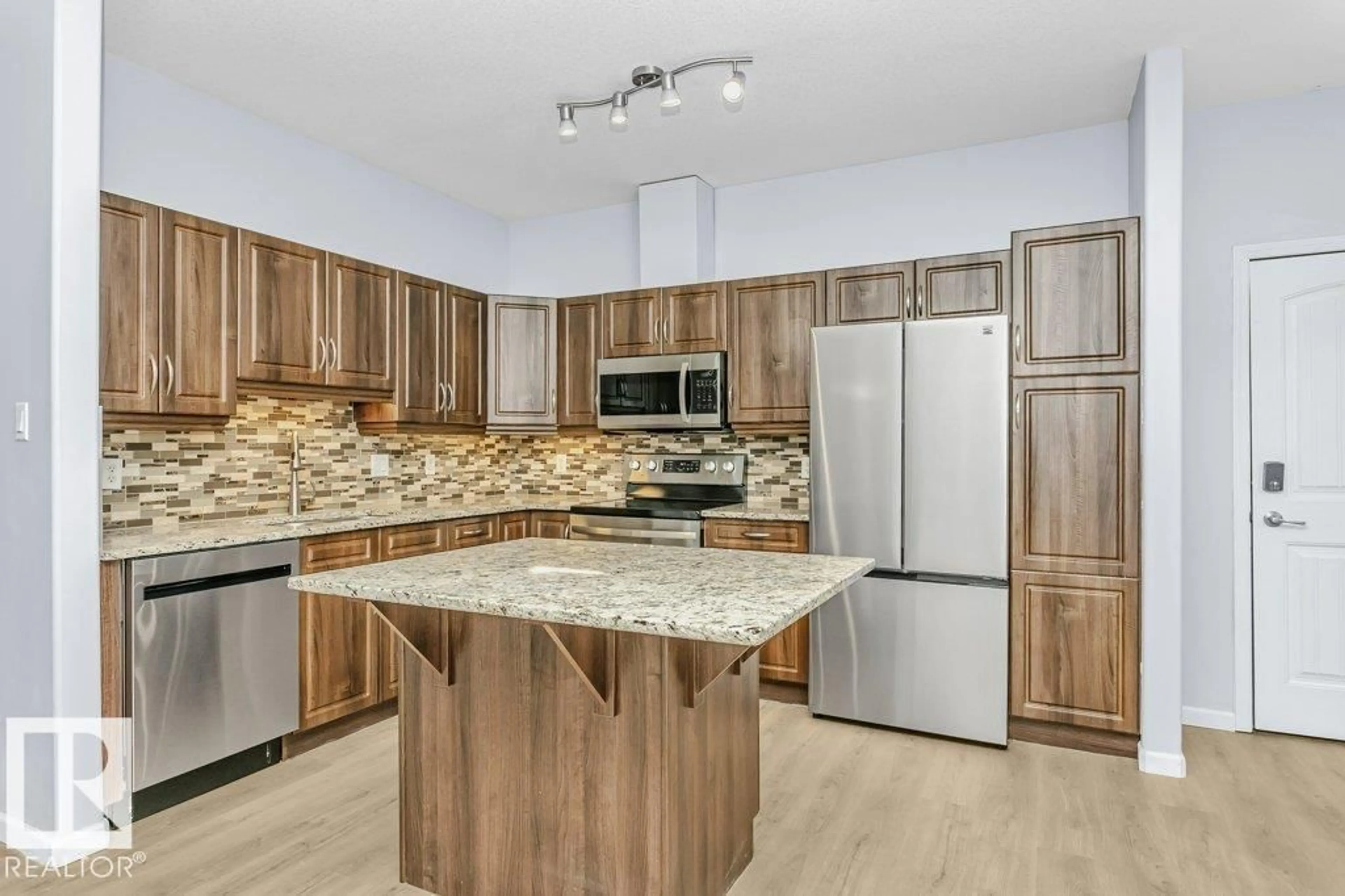 Open concept kitchen, unknown for 2503 - 119 HANNA CR, Edmonton Alberta T6R0H1