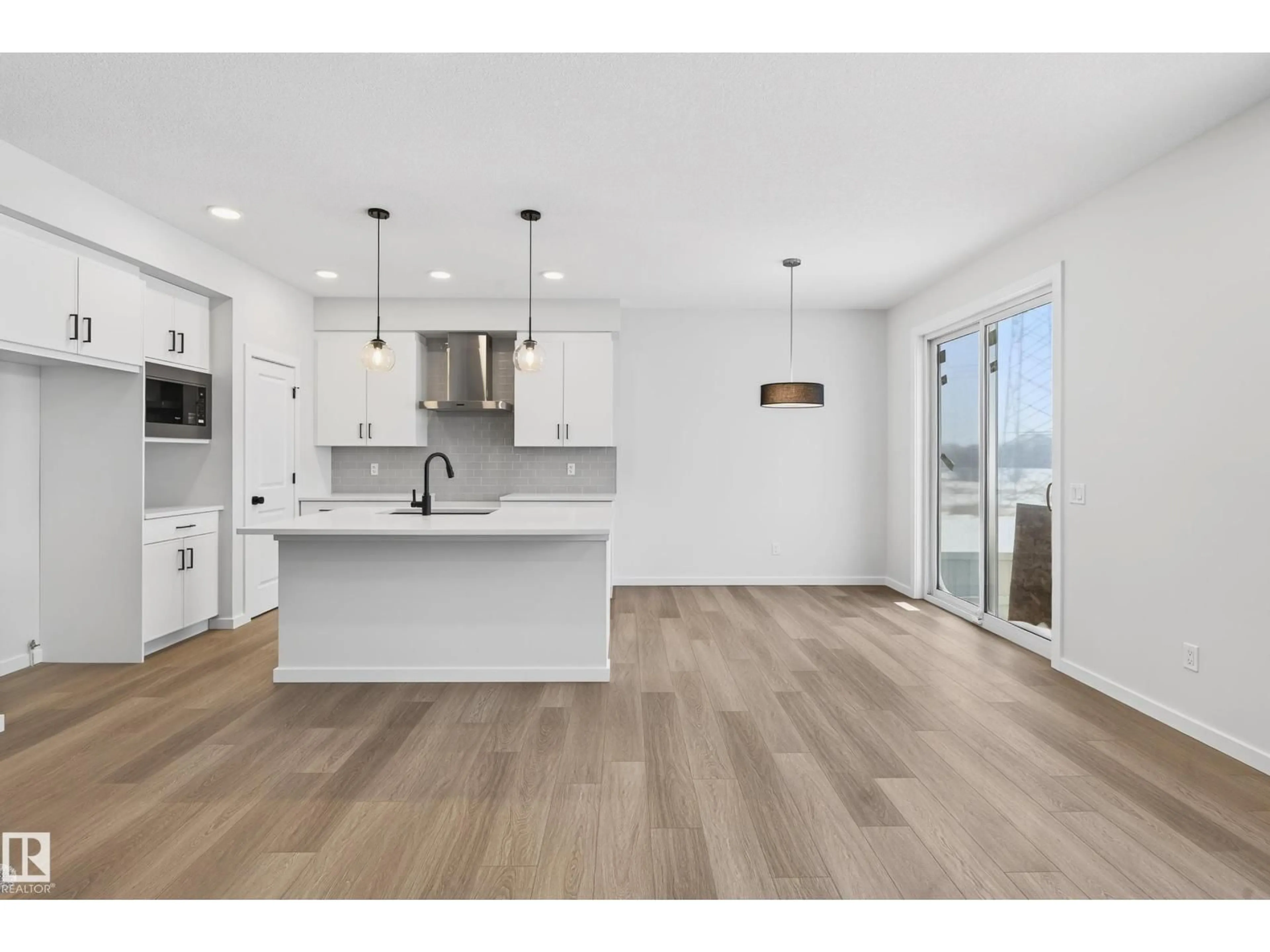 Open concept kitchen, unknown for NW - 17427 3 ST, Edmonton Alberta T5Y4G7