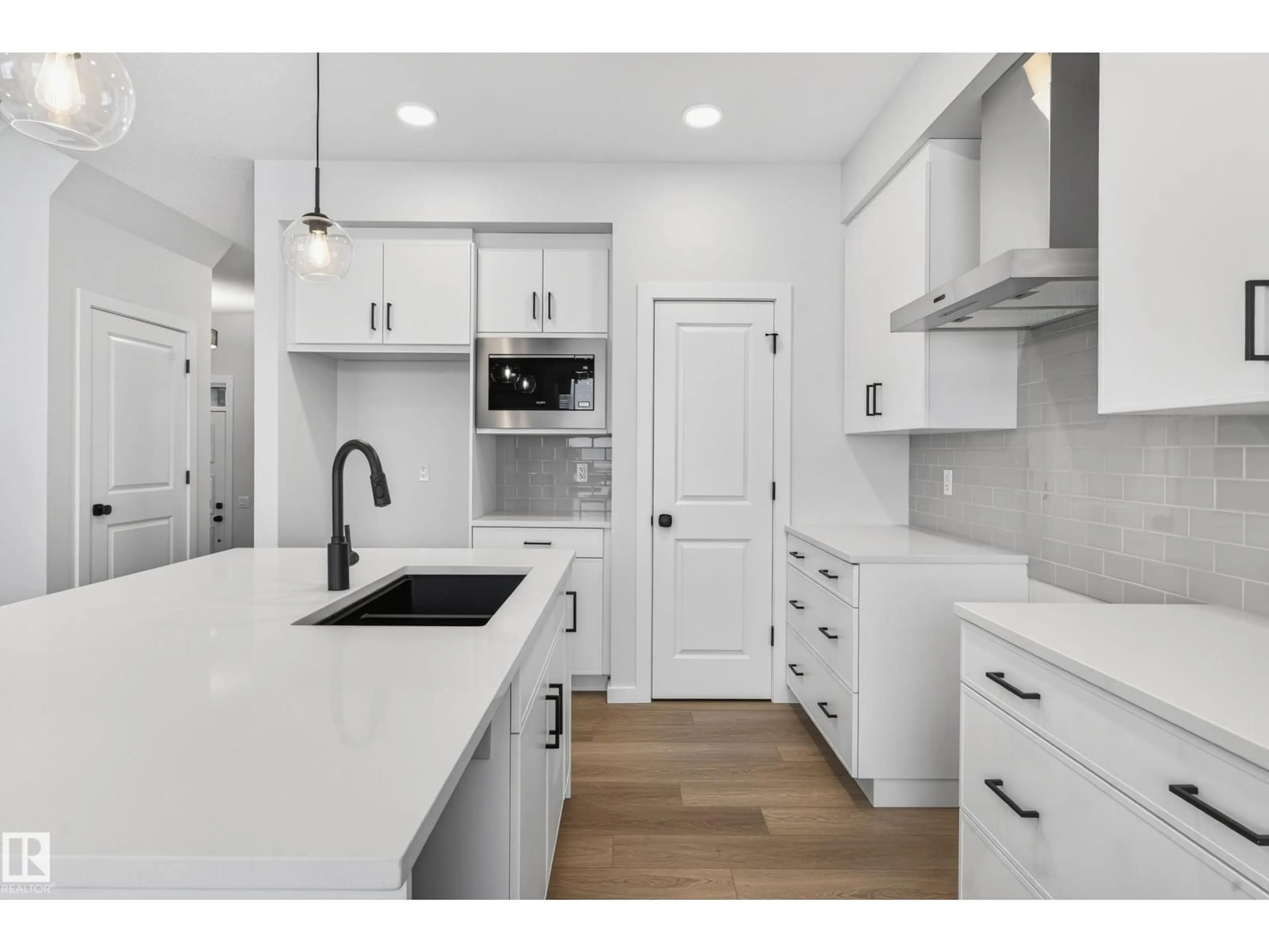 Open concept kitchen, unknown for NW - 17427 3 ST, Edmonton Alberta T5Y4G7