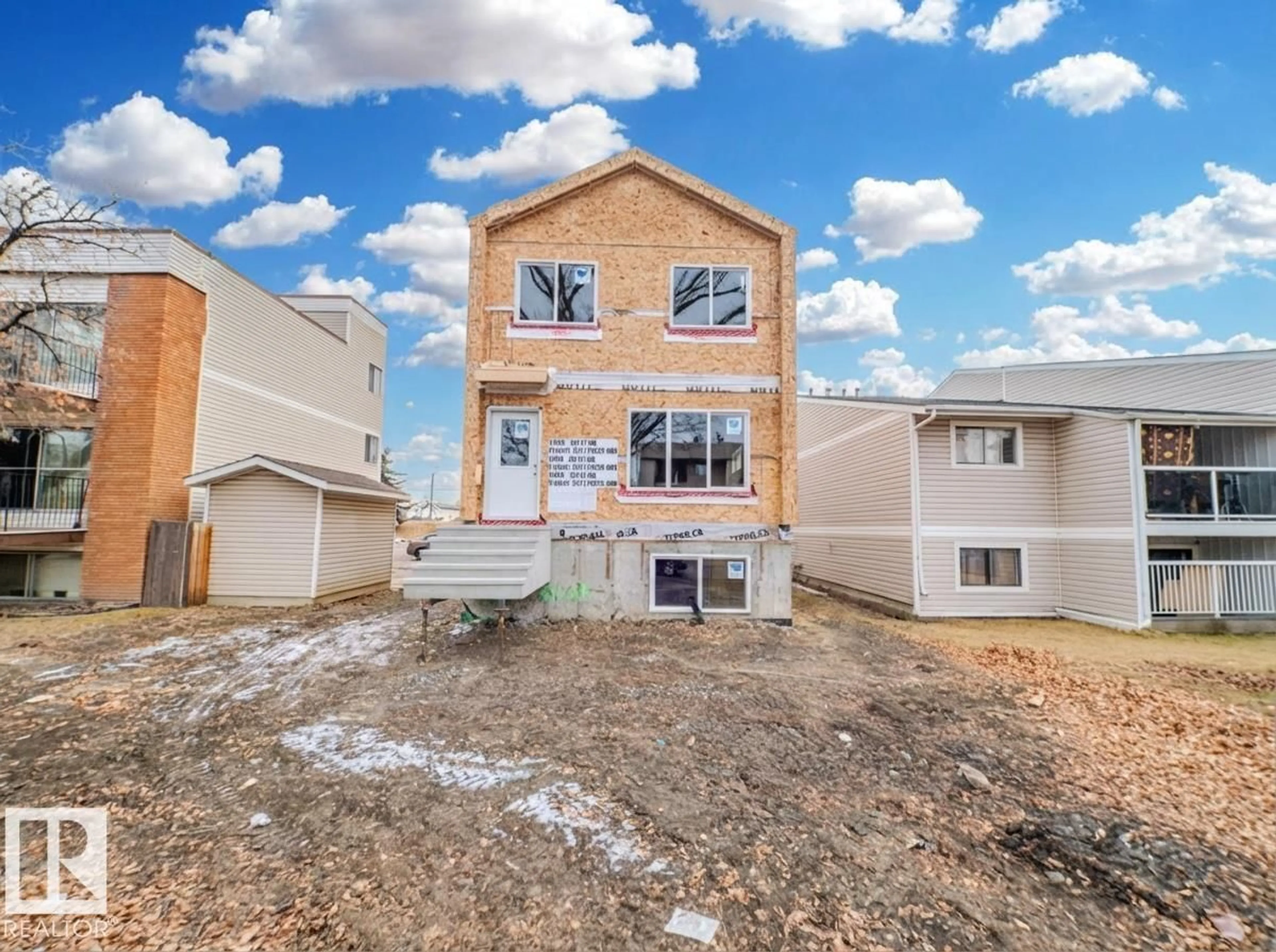 Home with vinyl exterior material, street for NW - 11939, 11941, 1 101 ST, Edmonton Alberta T5G2B8