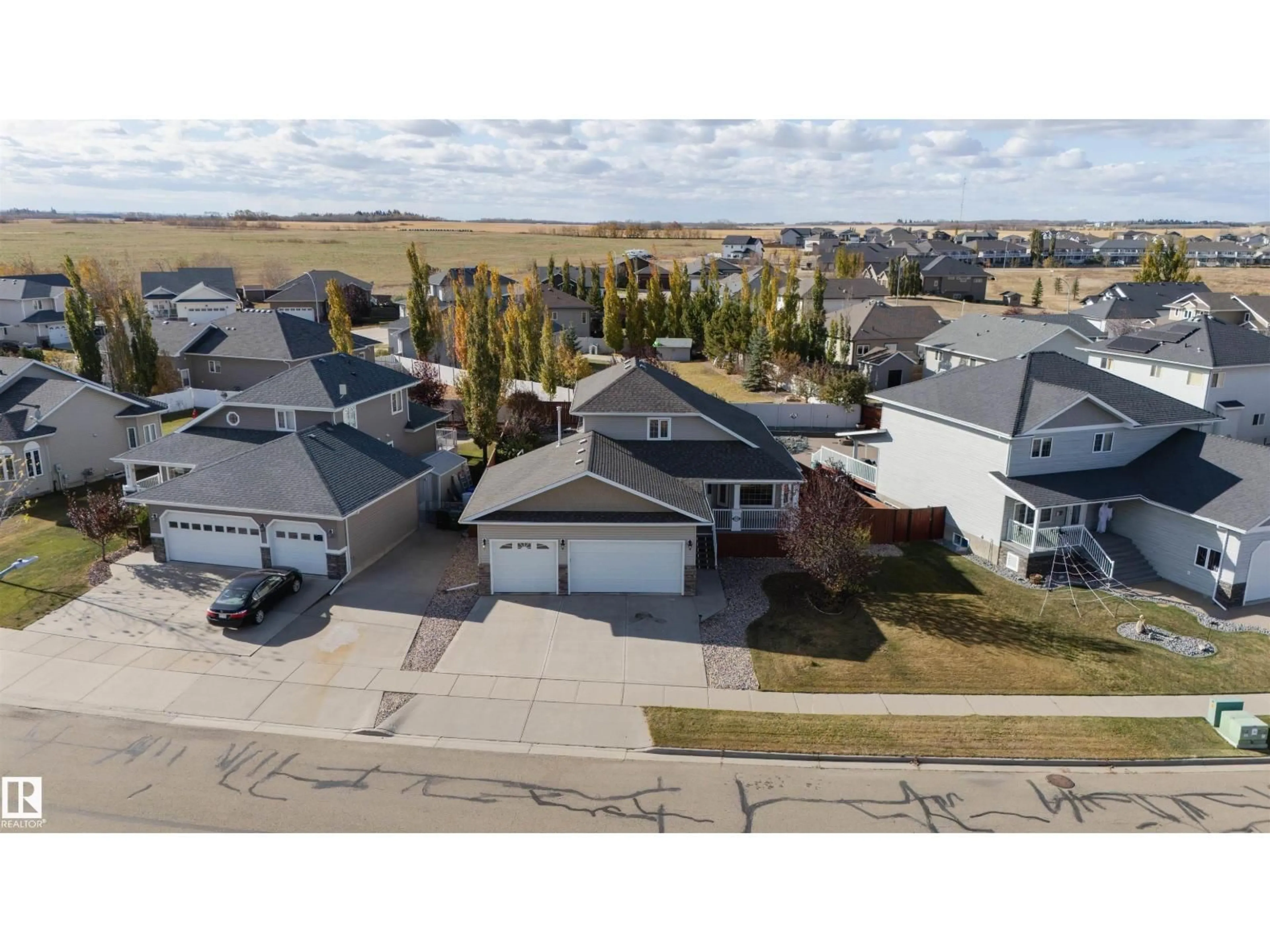 A pic from outside/outdoor area/front of a property/back of a property/a pic from drone, street for 3712 69 ST, Camrose Alberta T4V5B7