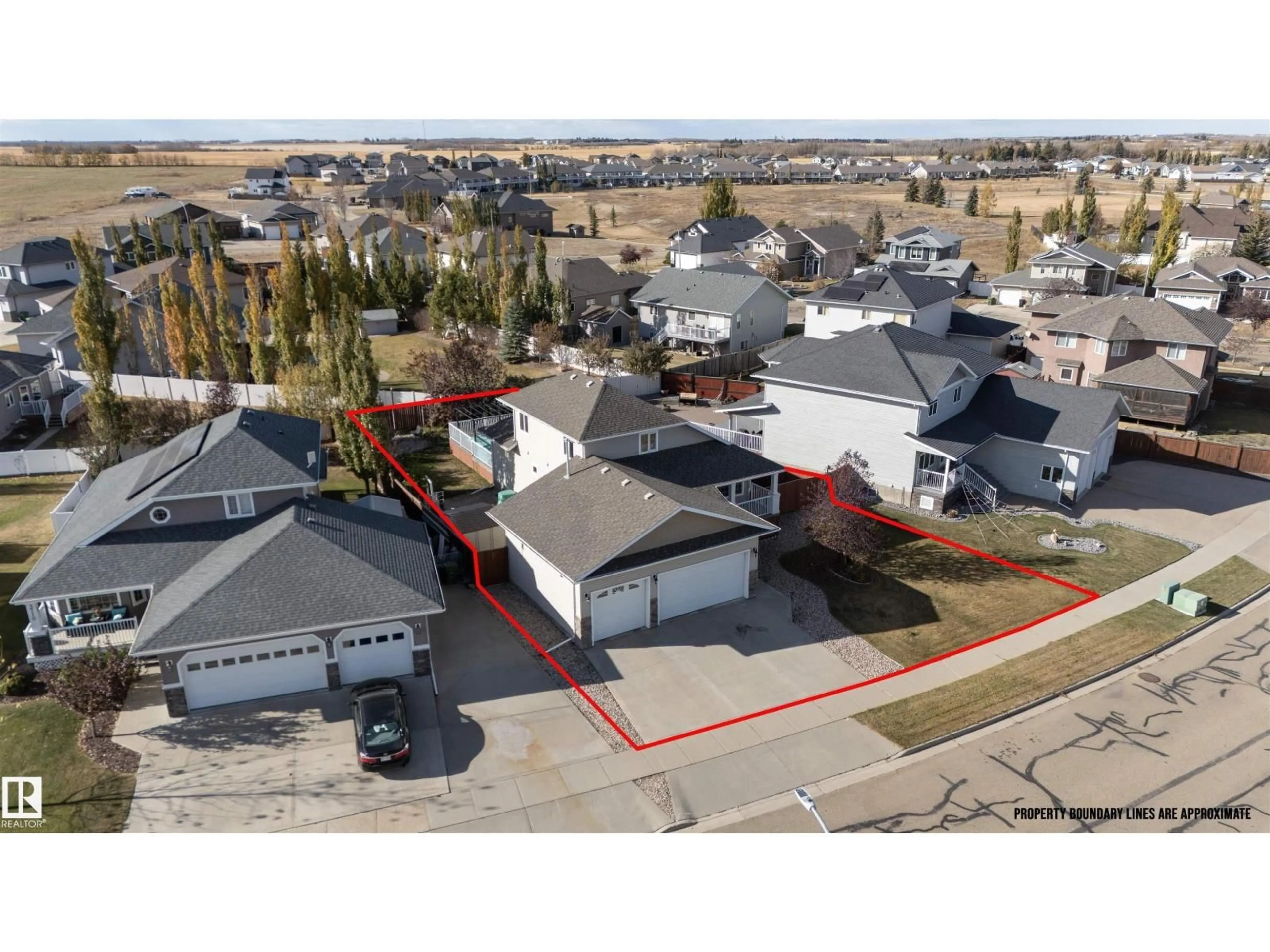 A pic from outside/outdoor area/front of a property/back of a property/a pic from drone, street for 3712 69 ST, Camrose Alberta T4V5B7