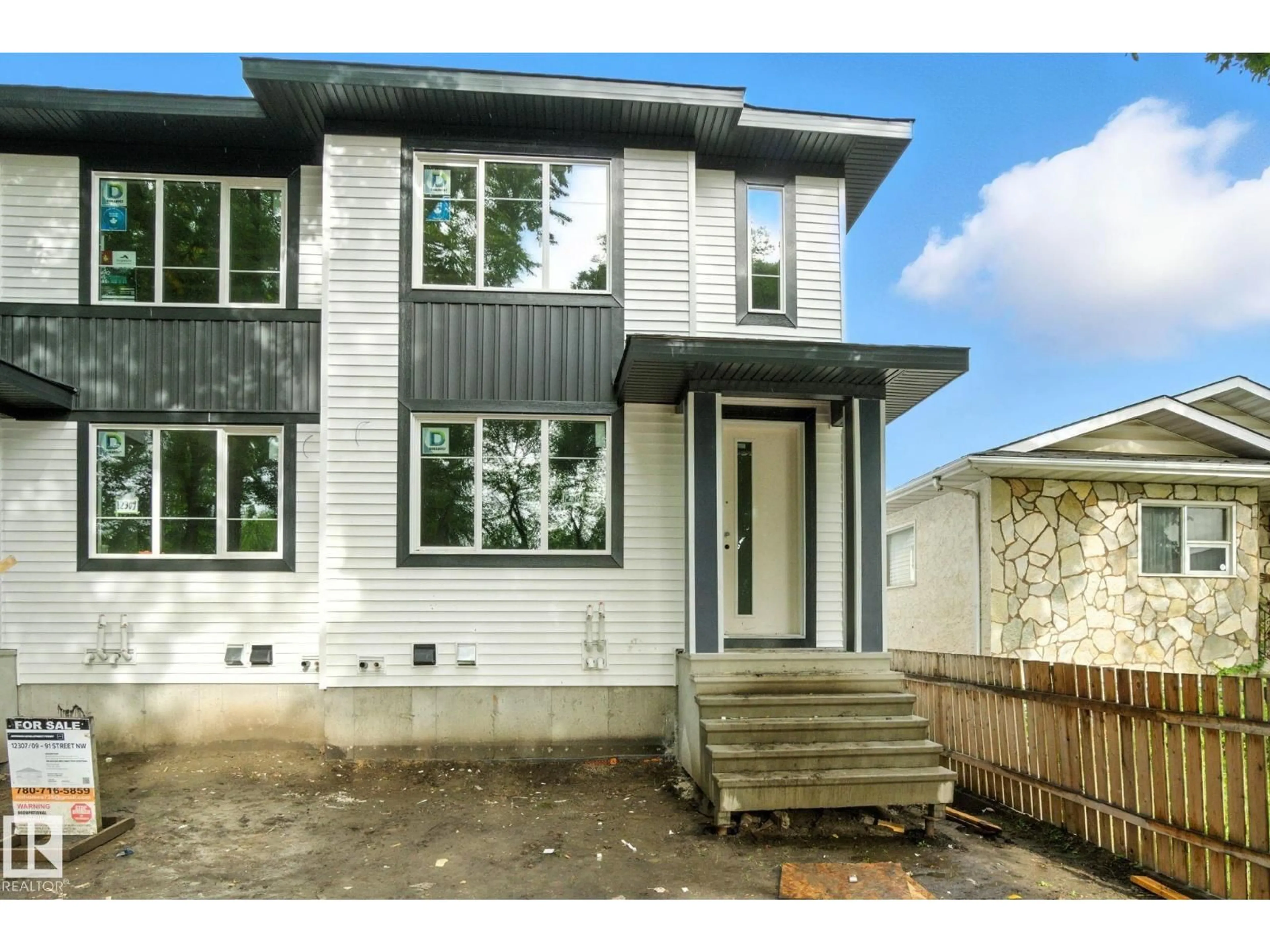 Home with vinyl exterior material, street for NW - 12307 91 ST, Edmonton Alberta T5B4C6
