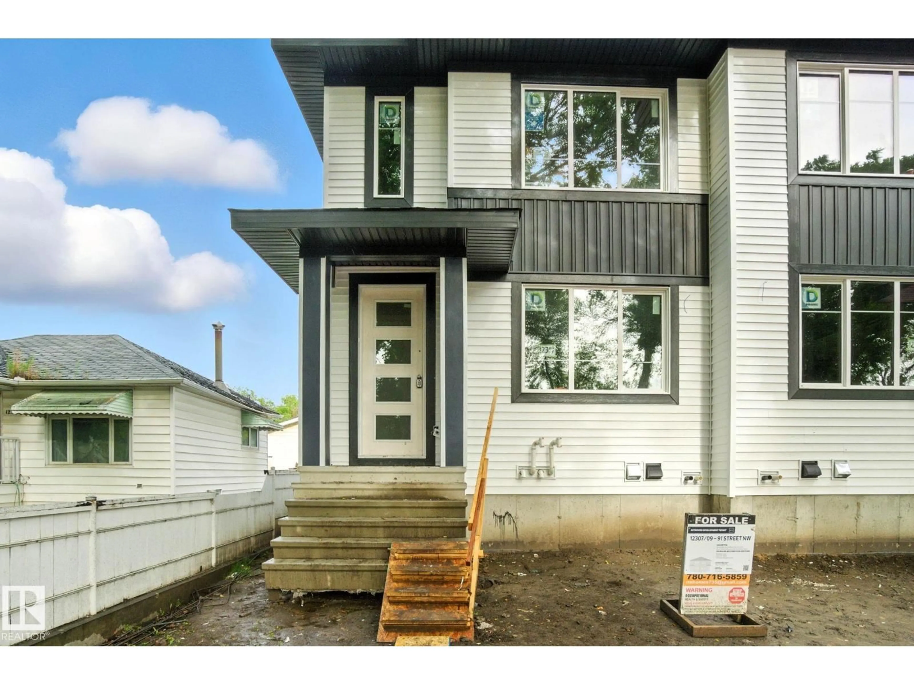 Home with vinyl exterior material, street for NW - 12309 91 ST, Edmonton Alberta T5B4C6