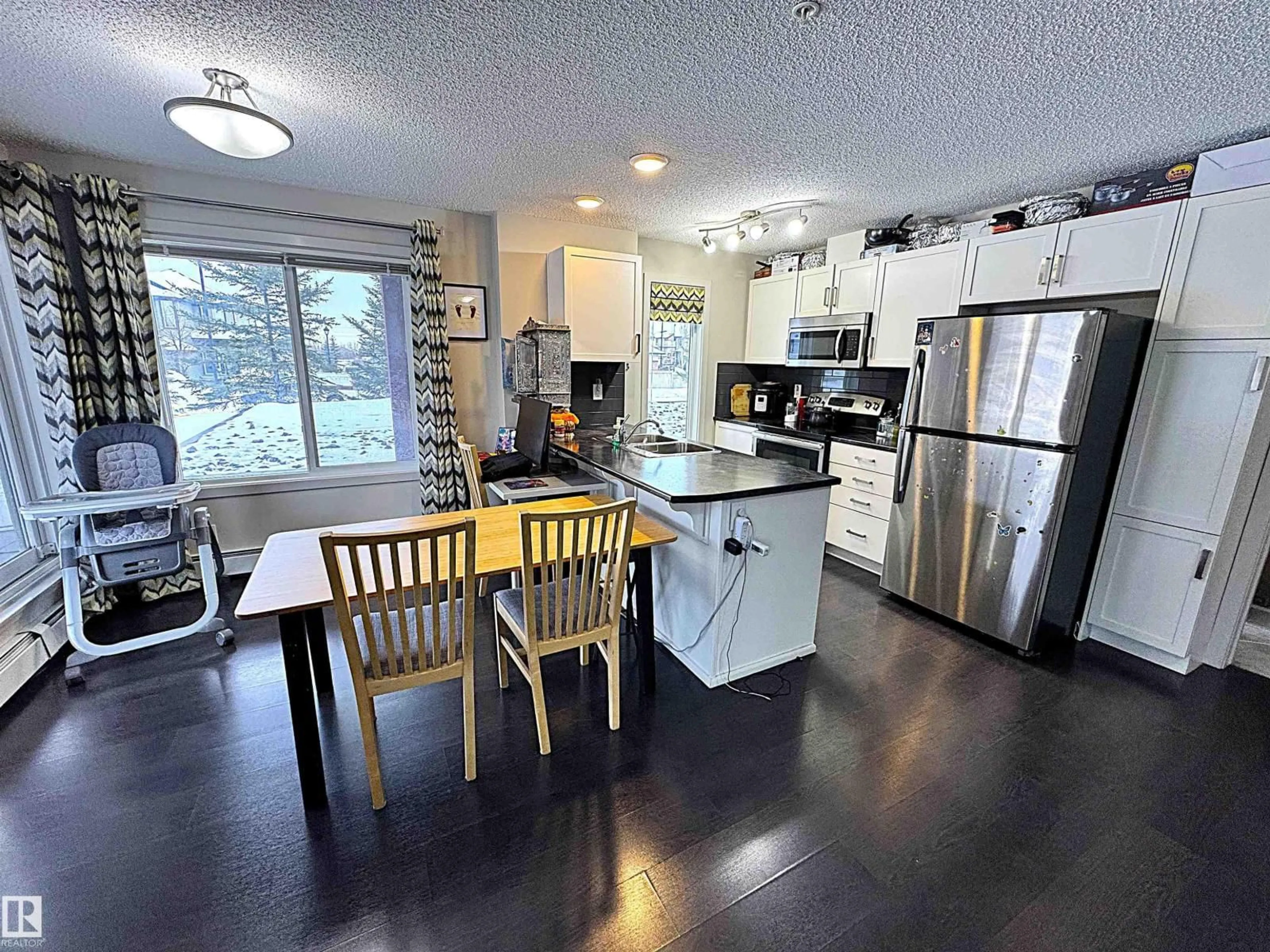 Open concept kitchen, unknown for 117 - 5521 7 AV SW, Edmonton Alberta T6X2A8