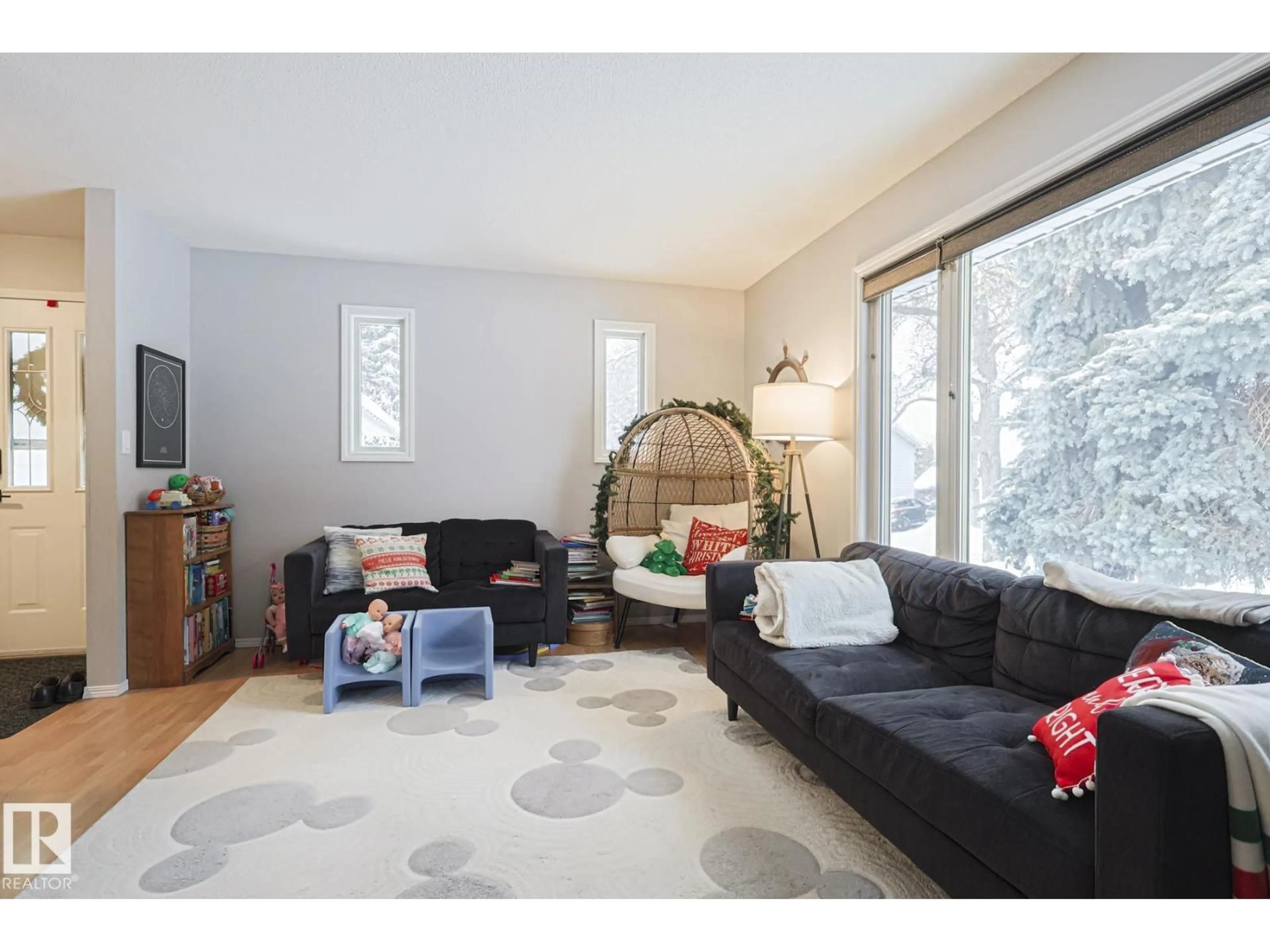 Living room with furniture, wood/laminate floor for 60 BELLEVUE CR, St. Albert Alberta T8N0A6